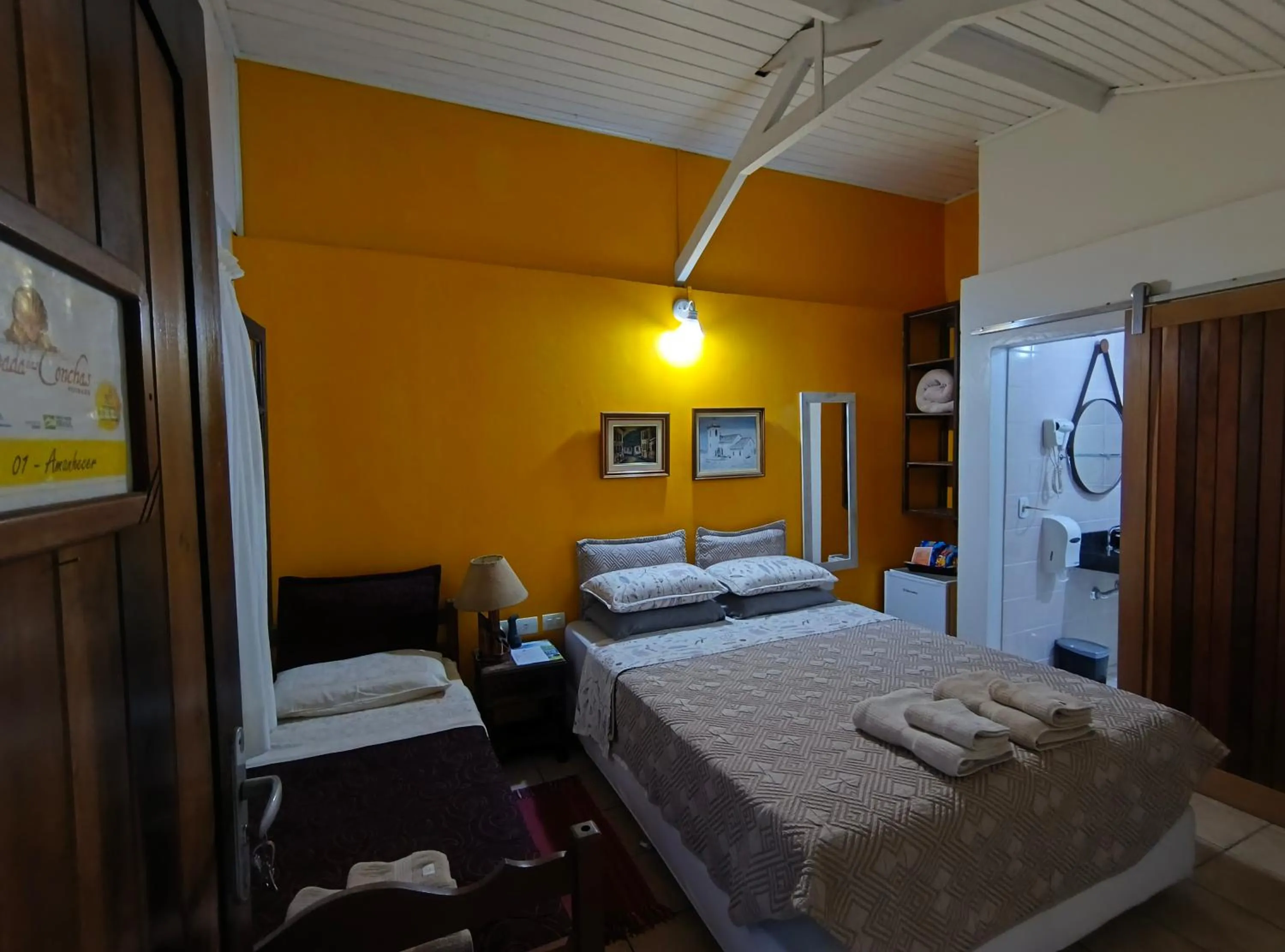 Bed in Pousada Enseada das Conchas