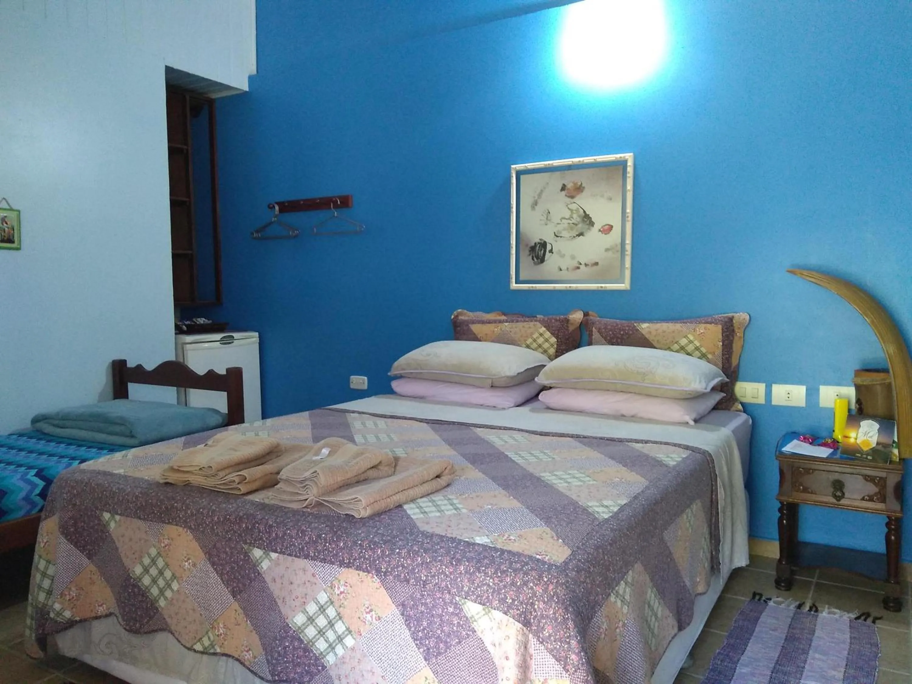 Bed in Pousada Enseada das Conchas