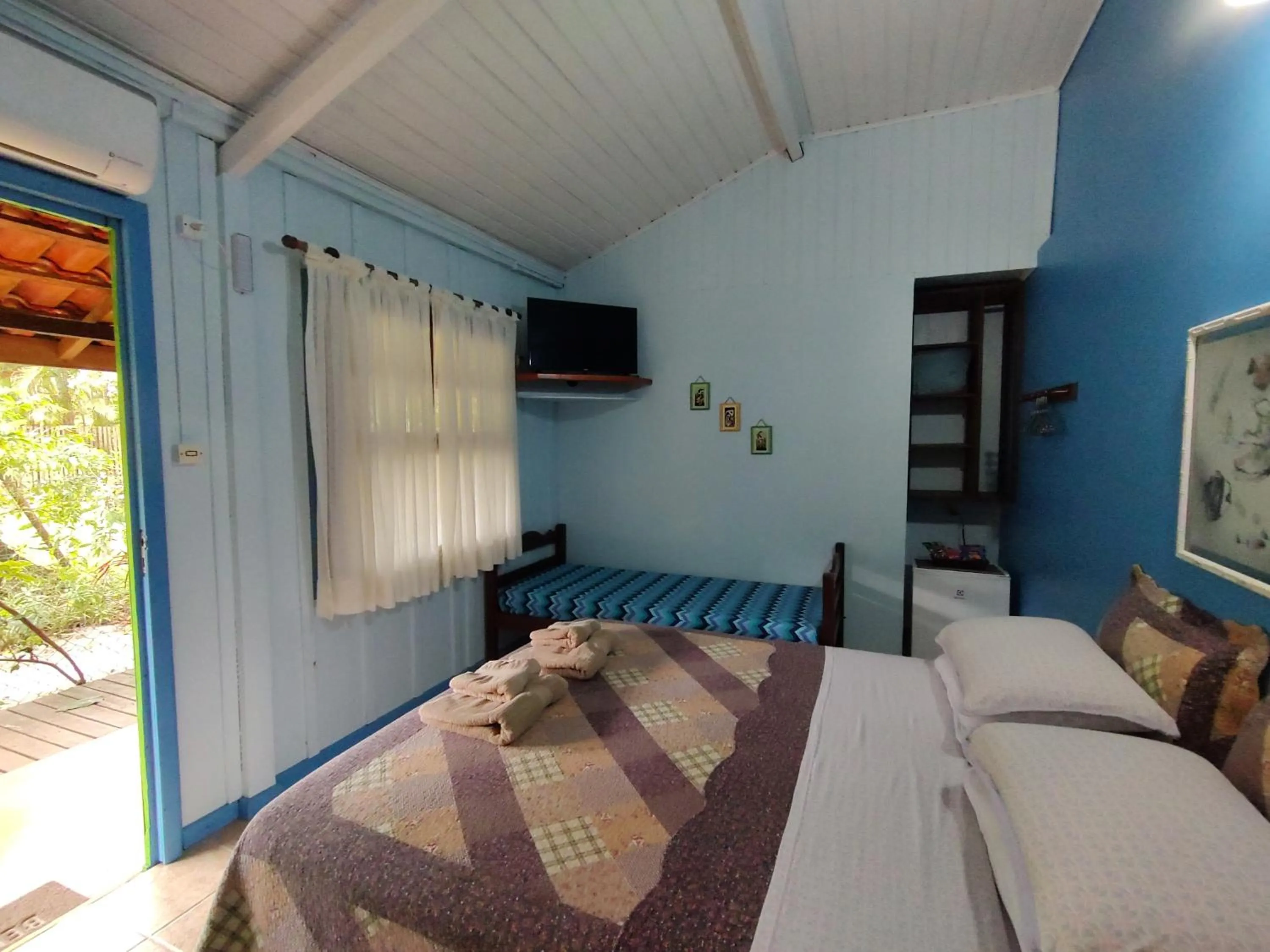 Bed in Pousada Enseada das Conchas