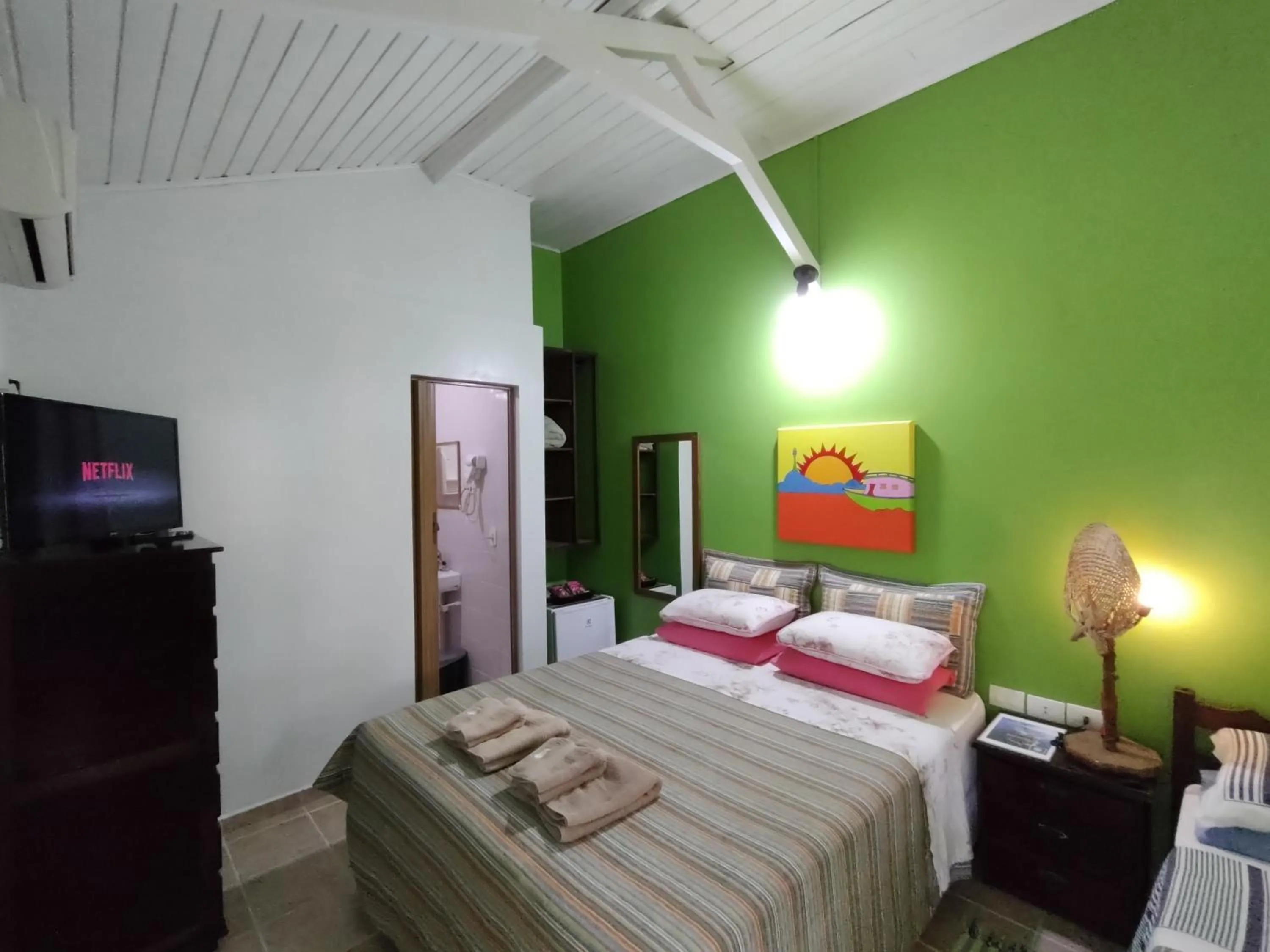 Bed in Pousada Enseada das Conchas