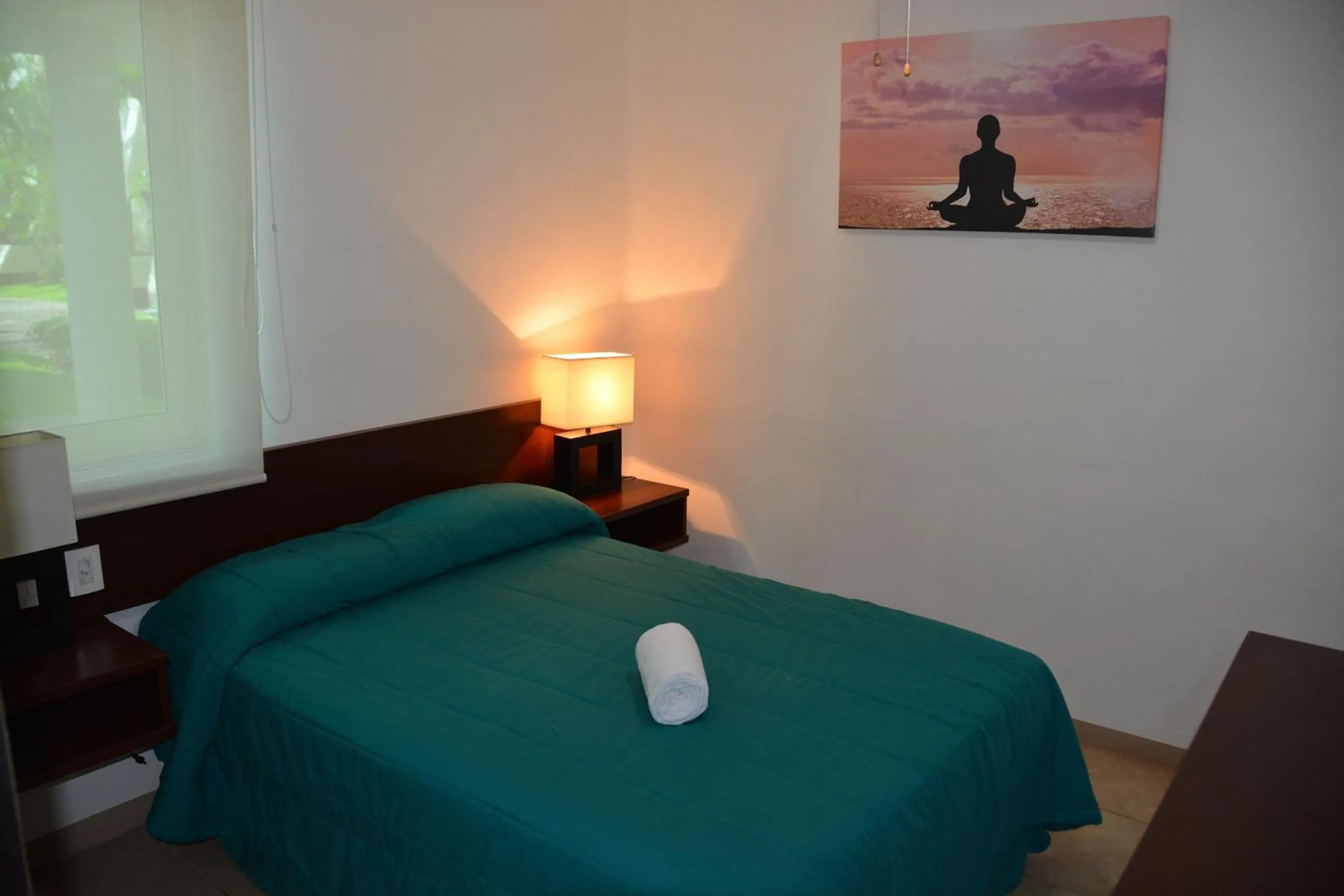 Bed in Zenharmony Suites