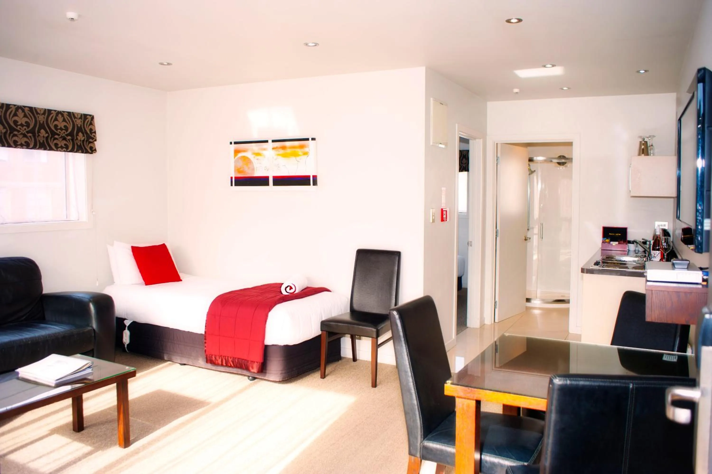 Bed in Dunedin Palms Motel