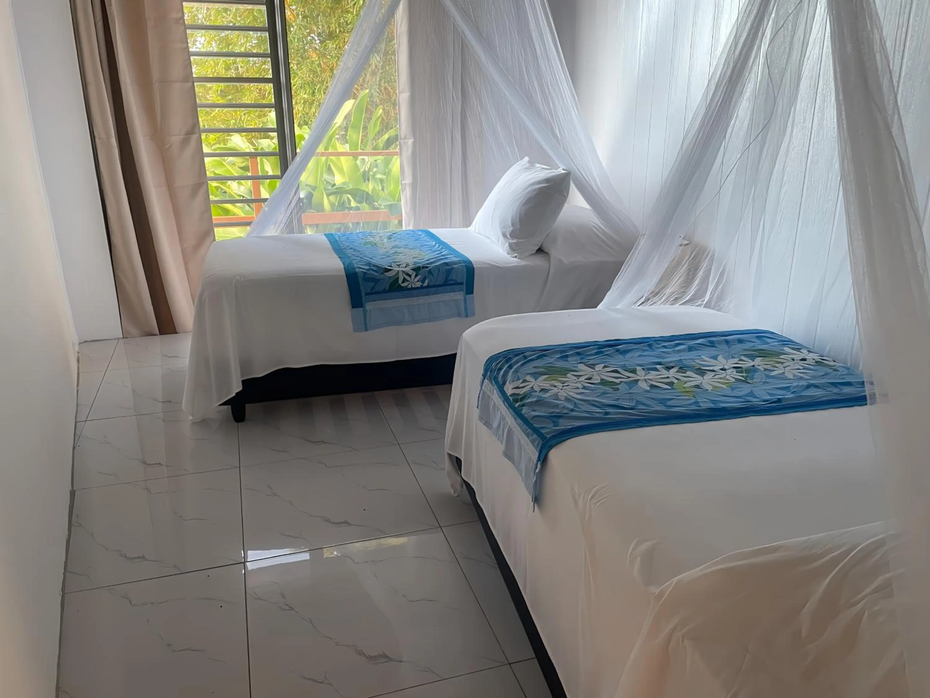 Bed in Fare Oviri Lodge