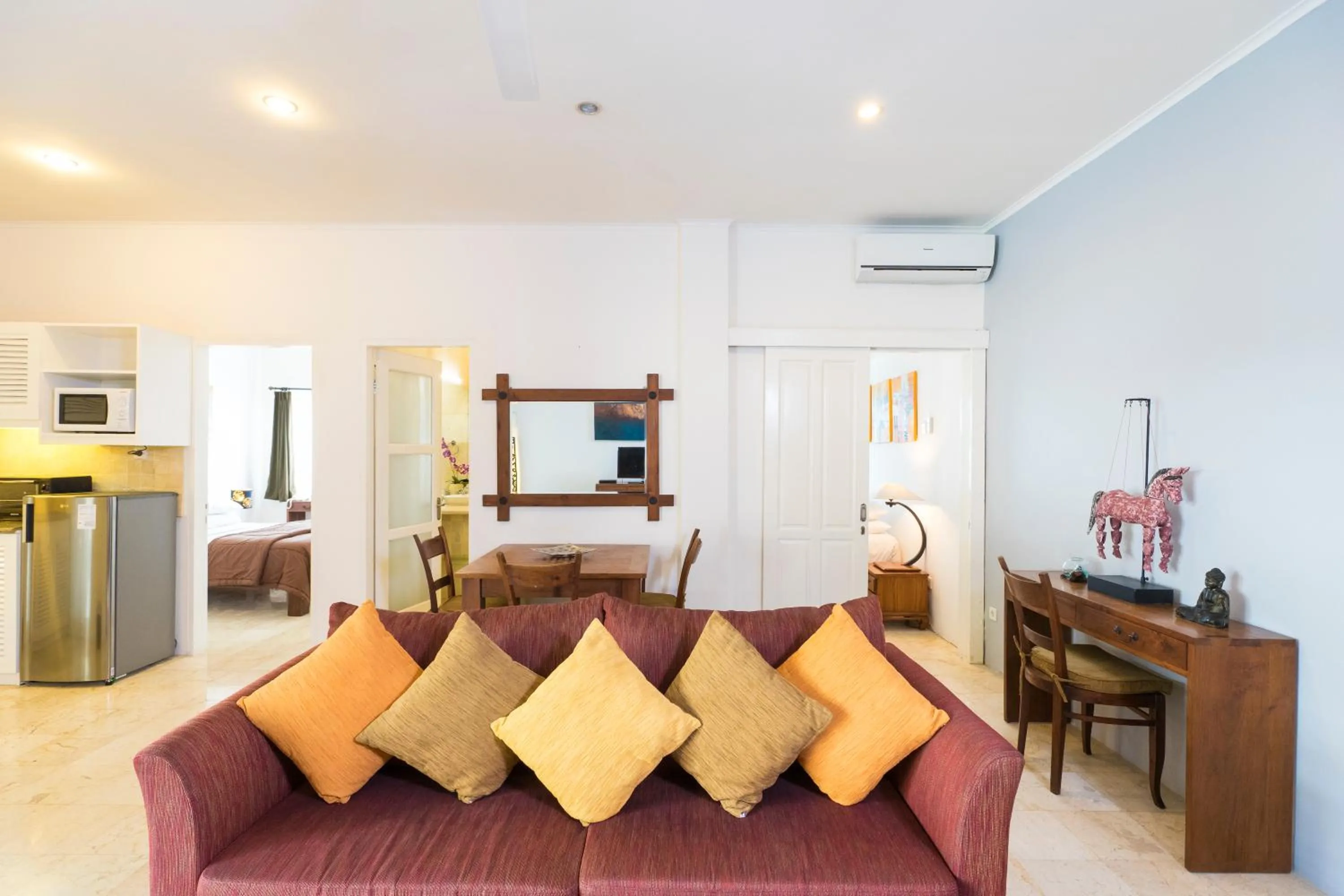 Living room, Bed in Beach Melati Apartments