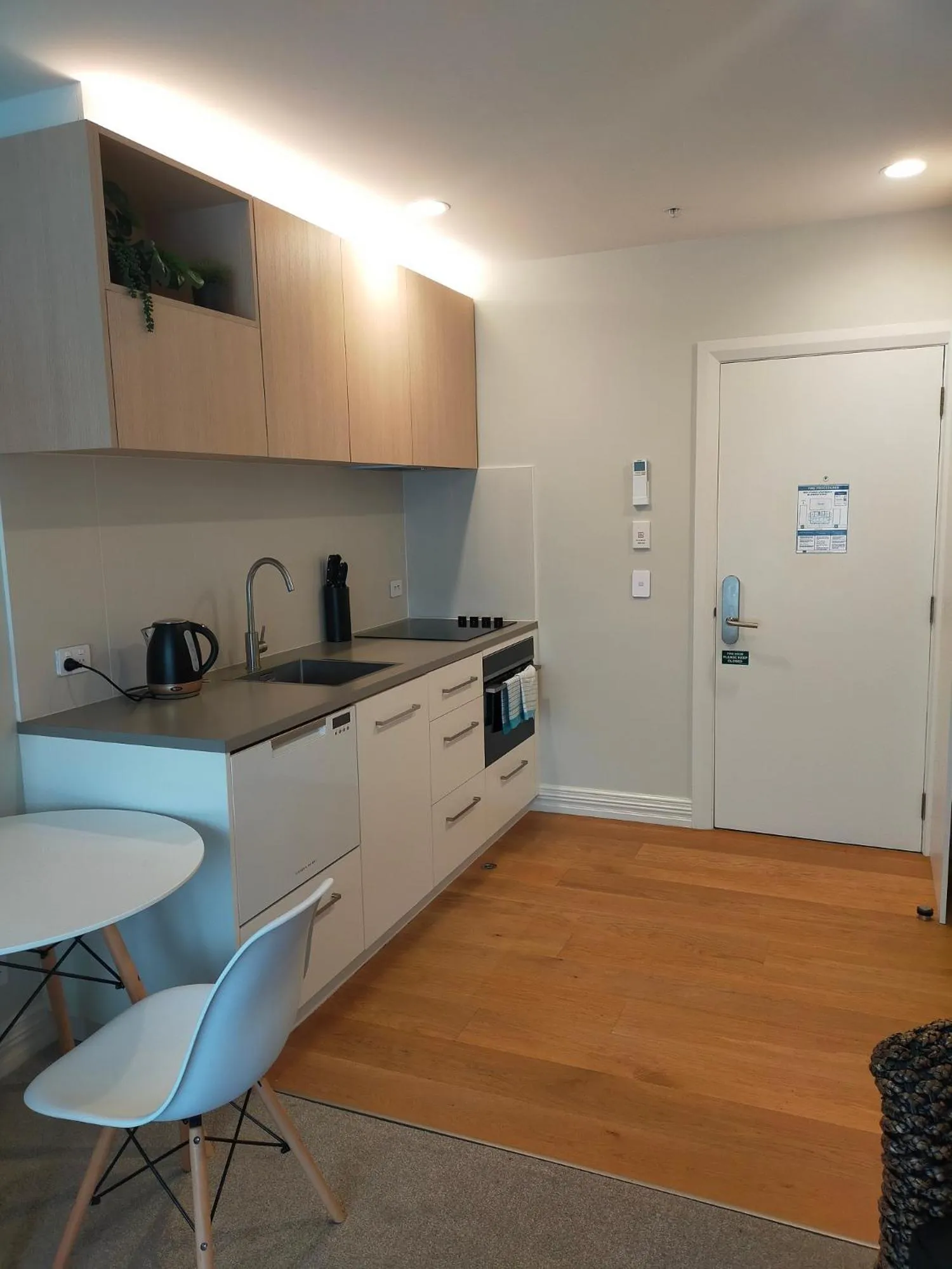 Kitchen or kitchenette in West Fitzroy Apartments
