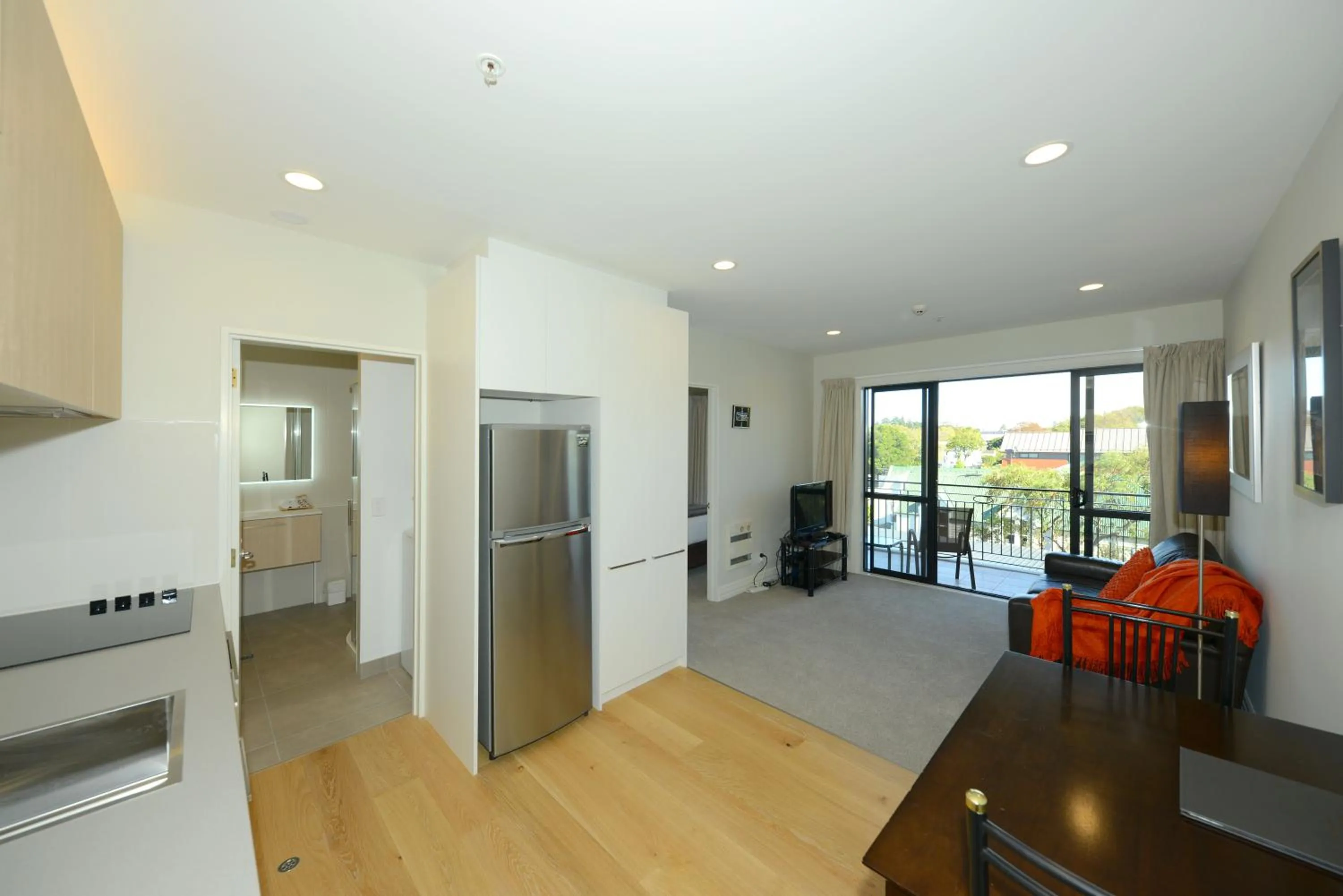Kitchen or kitchenette in West Fitzroy Apartments