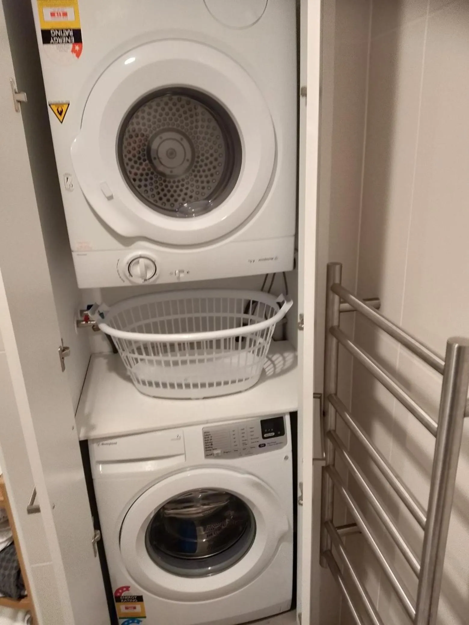 washing machine in West Fitzroy Apartments