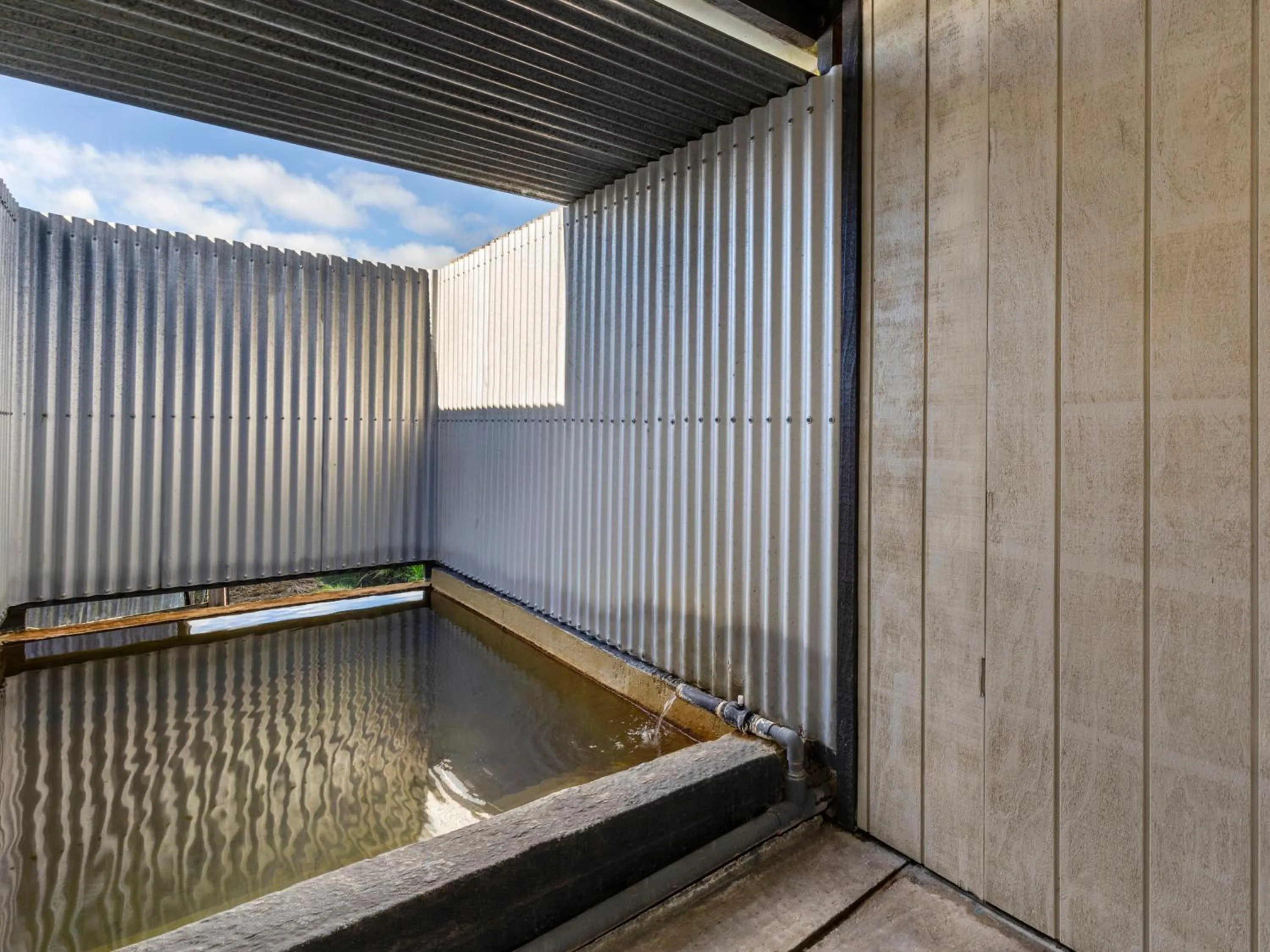 Hot Spring Bath in Rainbow Motel & Hot Pools