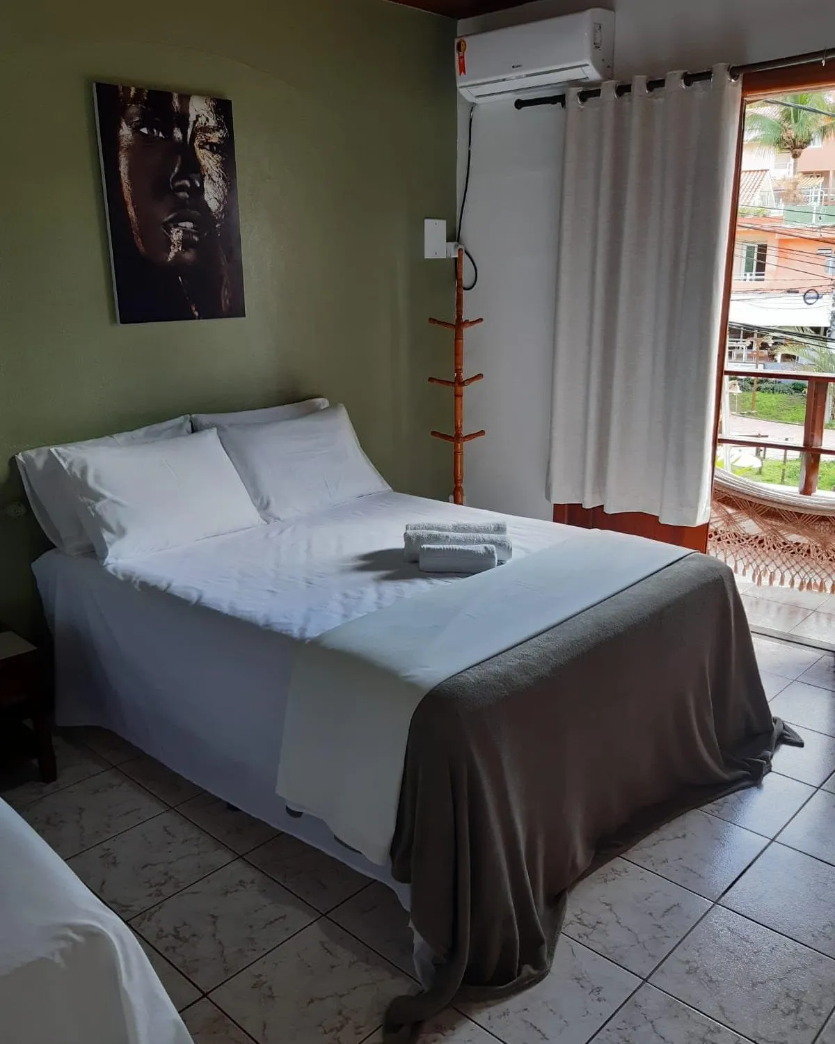 Bed in Pousada da praça