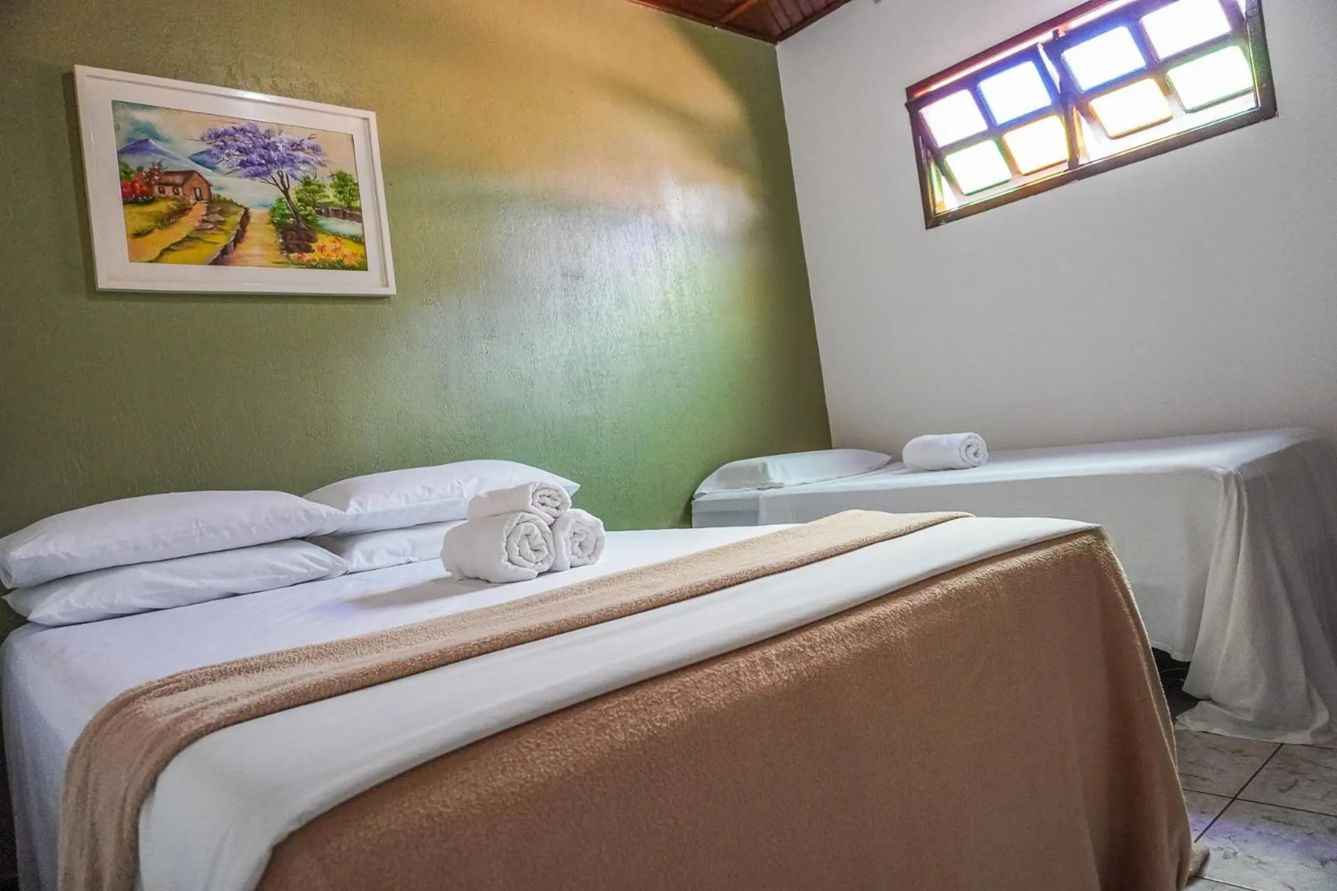 Bed in Pousada da praça