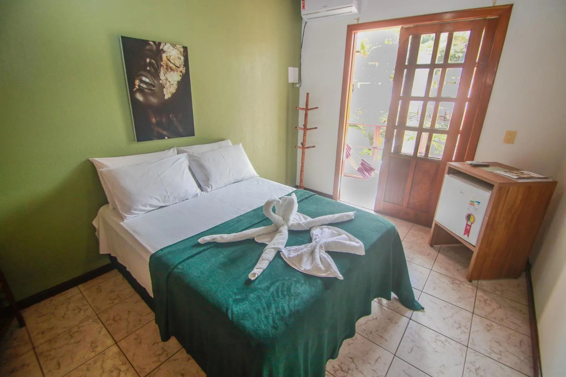 Bed in Pousada da praça