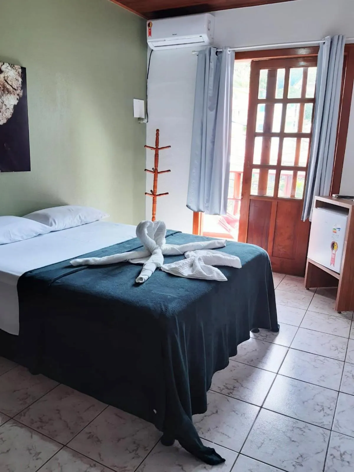 Bed in Pousada da praça