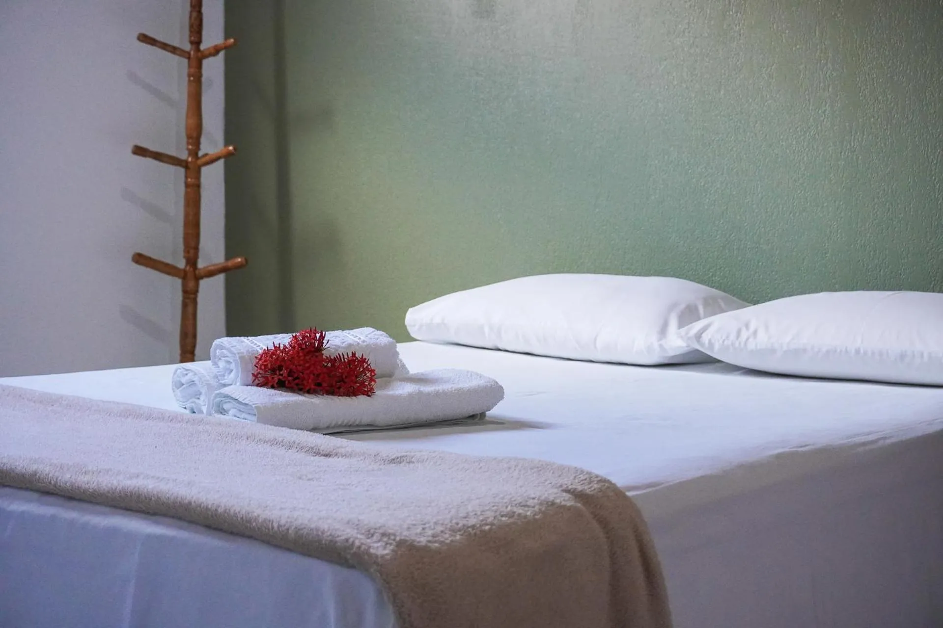 Bed in Pousada da praça