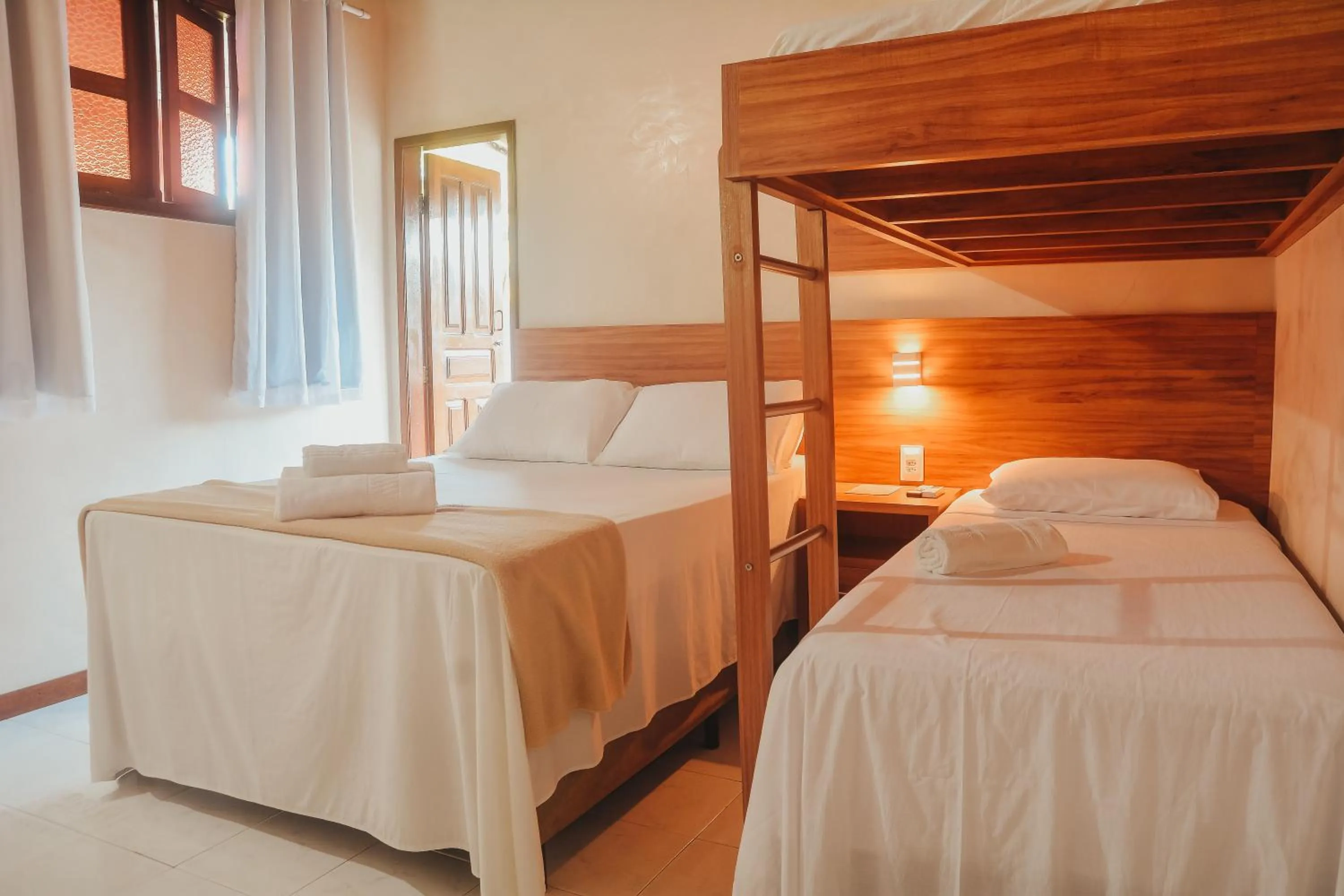 Bed in Pousada da praça