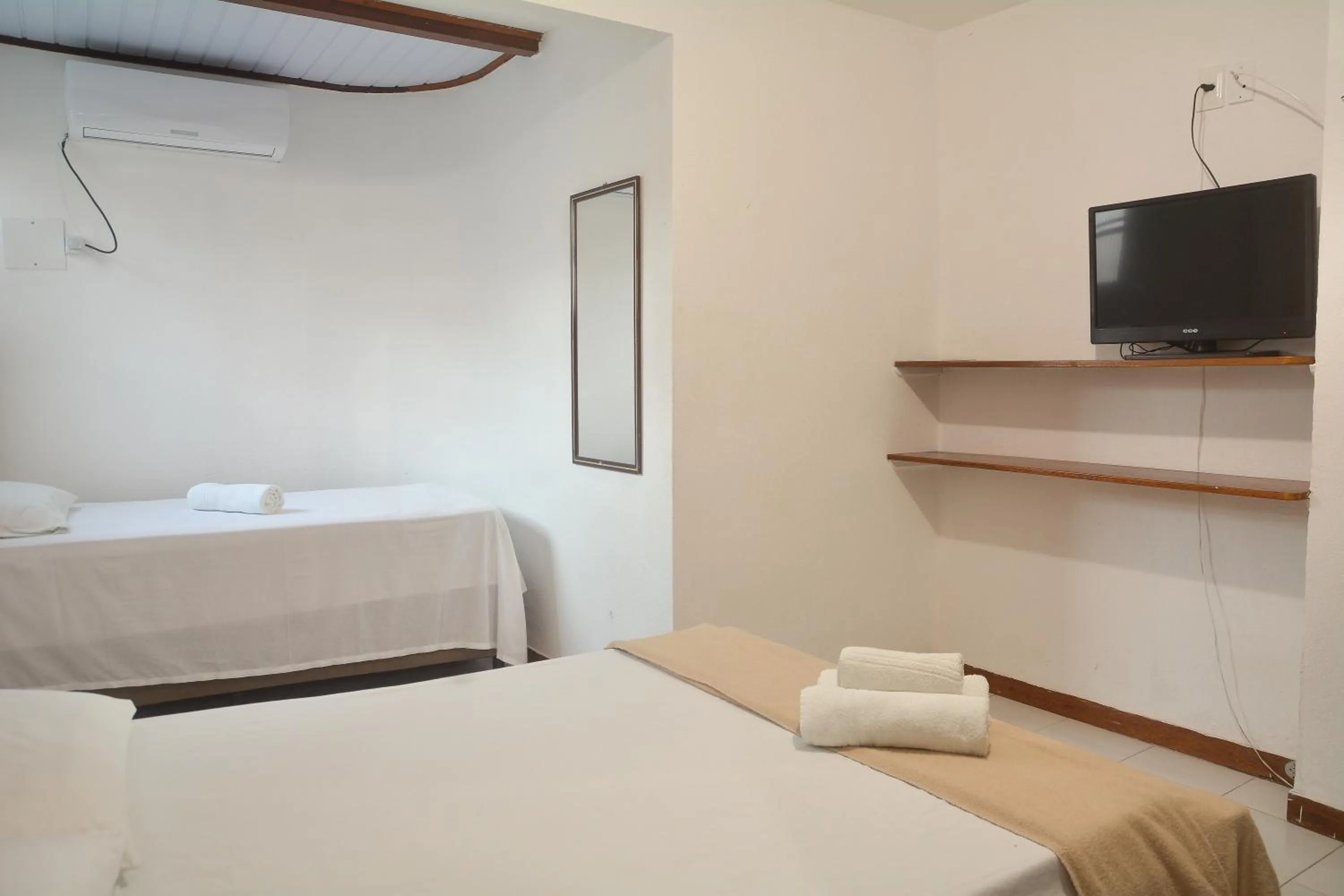 Bed in Pousada da praça