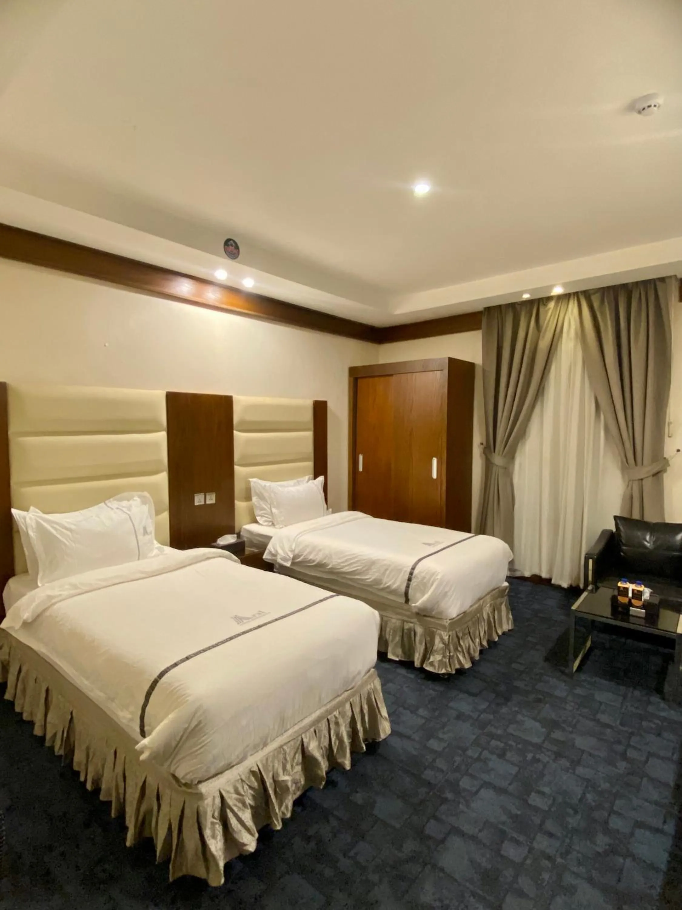 Bed in Aral Hotel Apartments