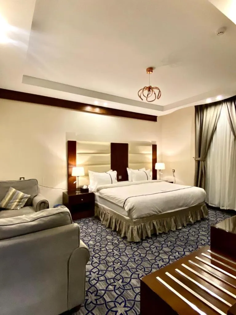 Bed in Aral Hotel Apartments