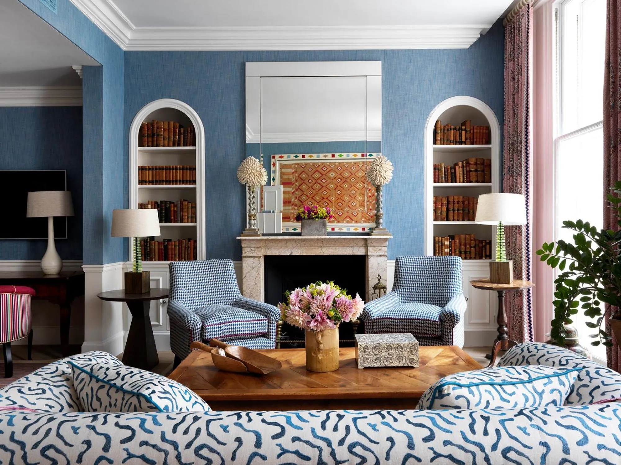 Seating area, Bed in Haymarket Hotel, Firmdale Hotels