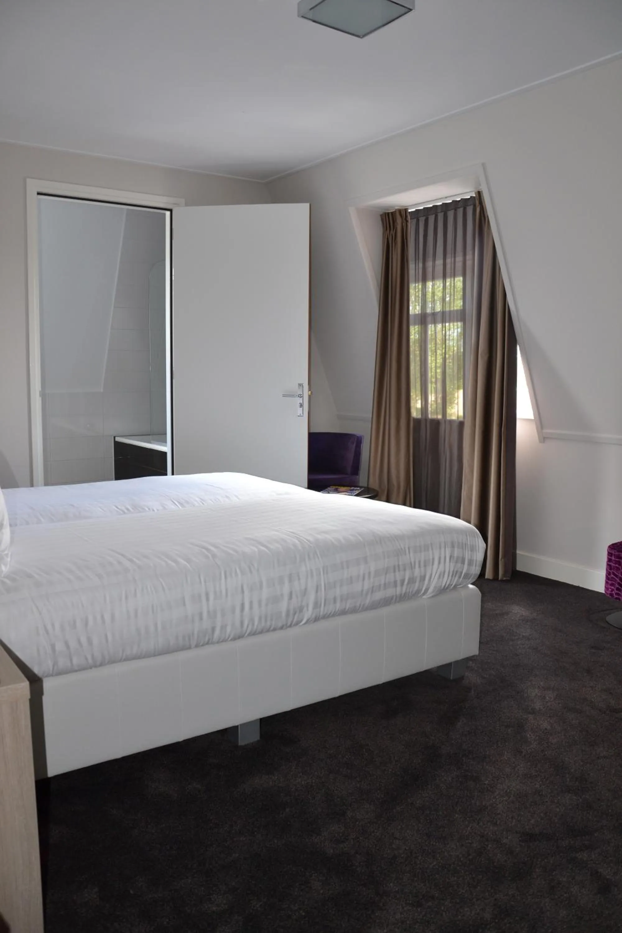 Bed in Fletcher Hotel-Restaurant Duinzicht