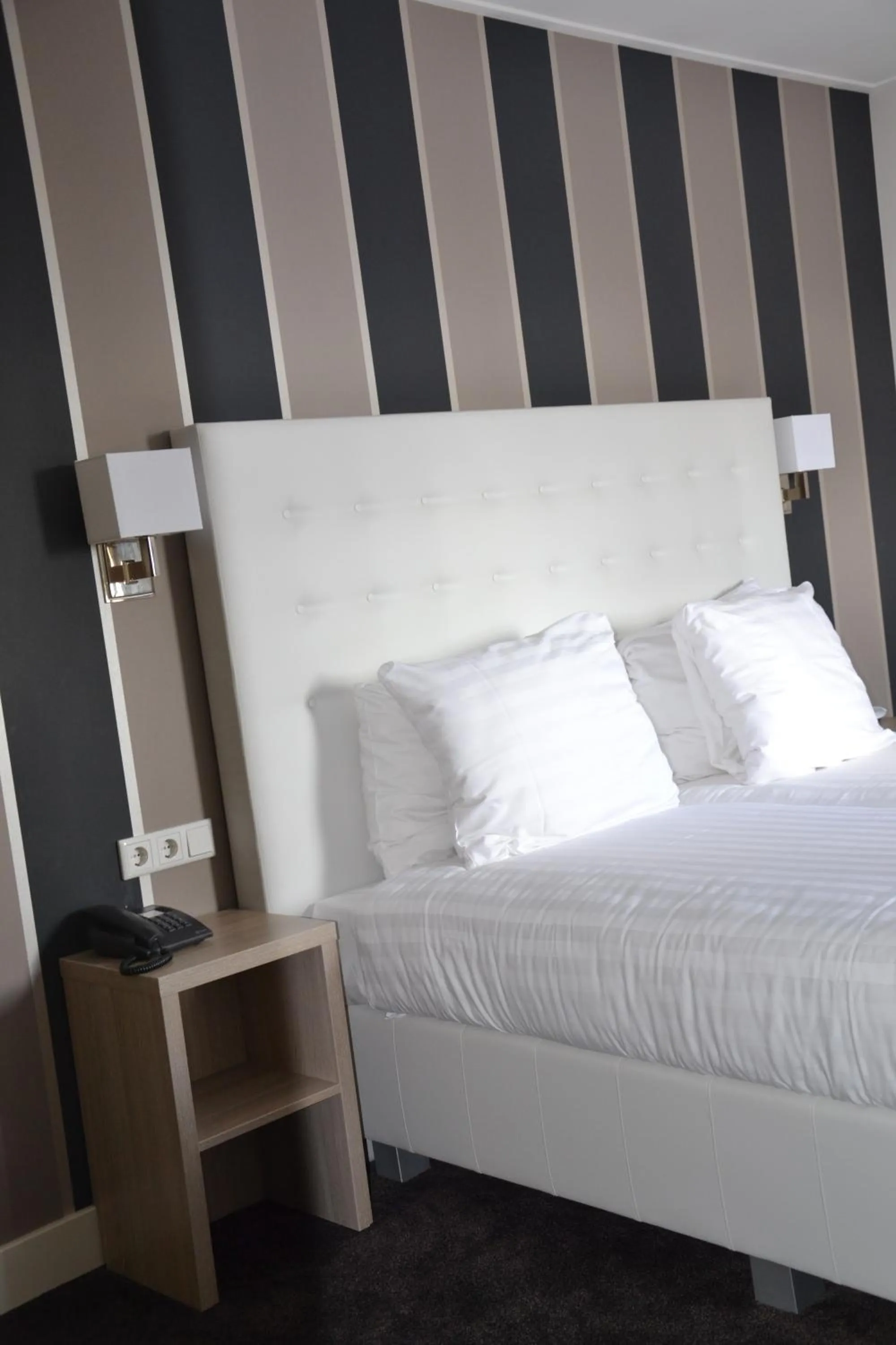 Bed in Fletcher Hotel-Restaurant Duinzicht