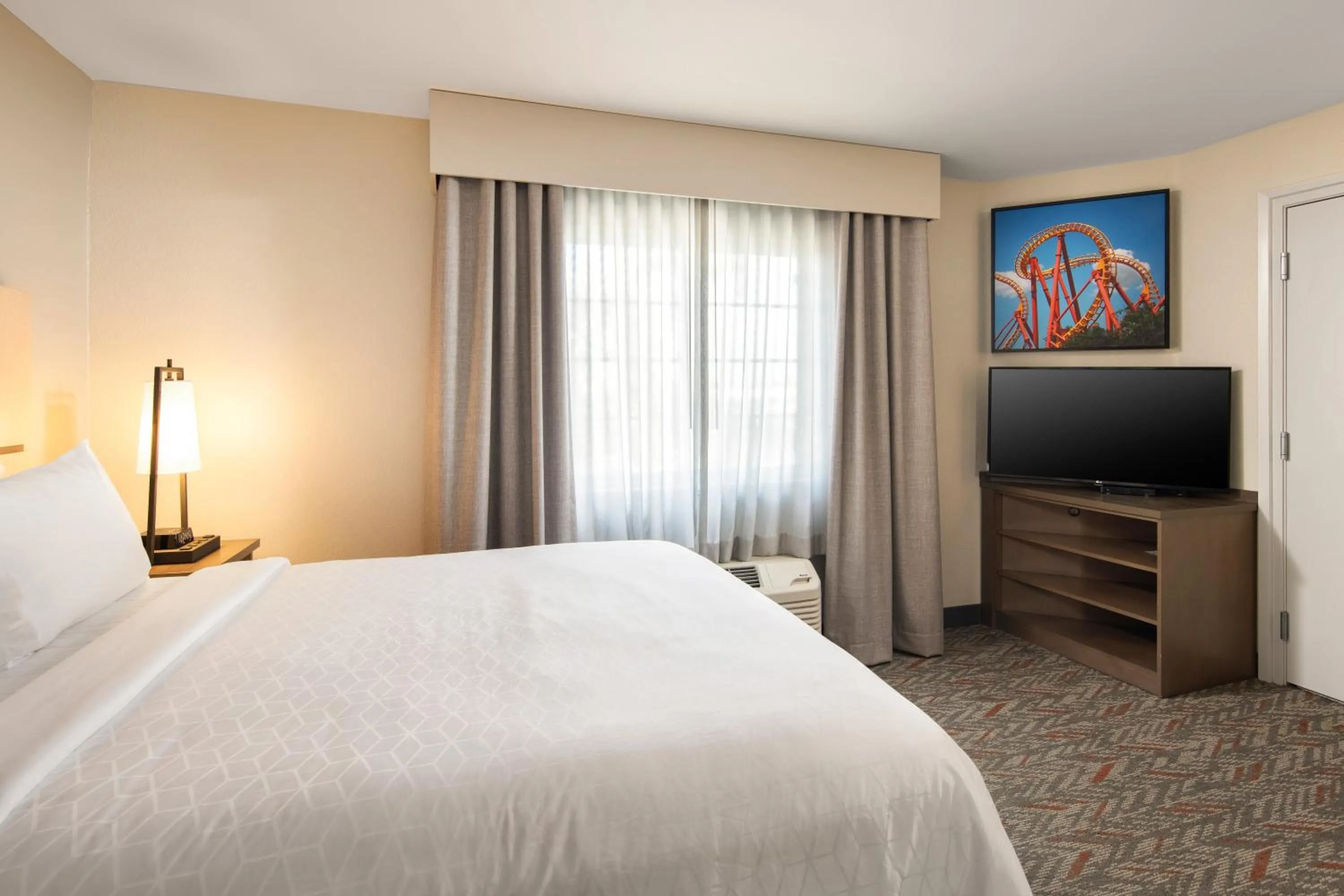 Bedroom, Bed in Candlewood Suites Anaheim - Resort Area by IHG