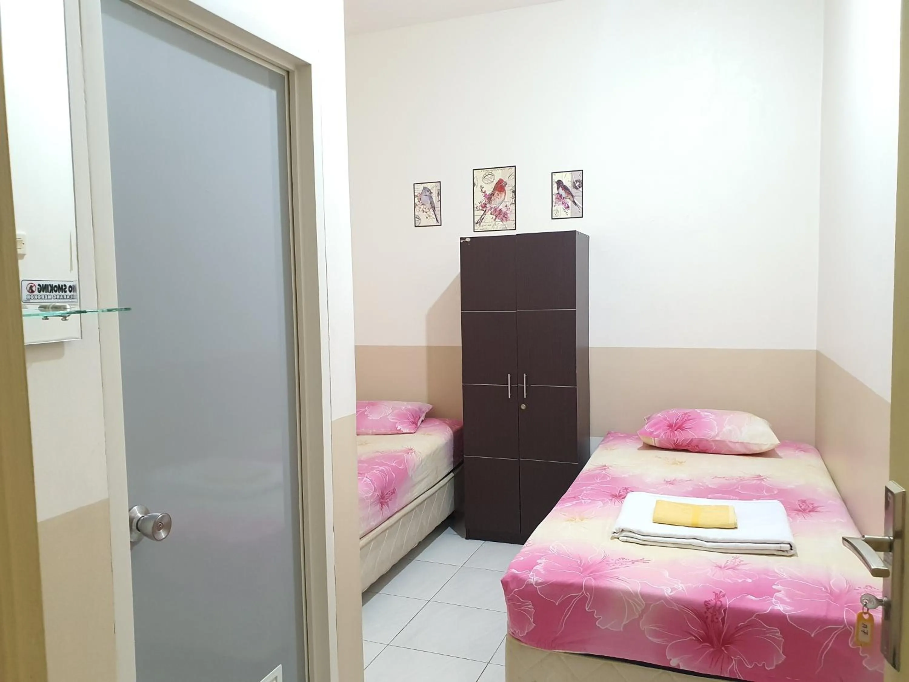 Bedroom, Bed in Delta Inn Bogor Syariah for Indonesian Only