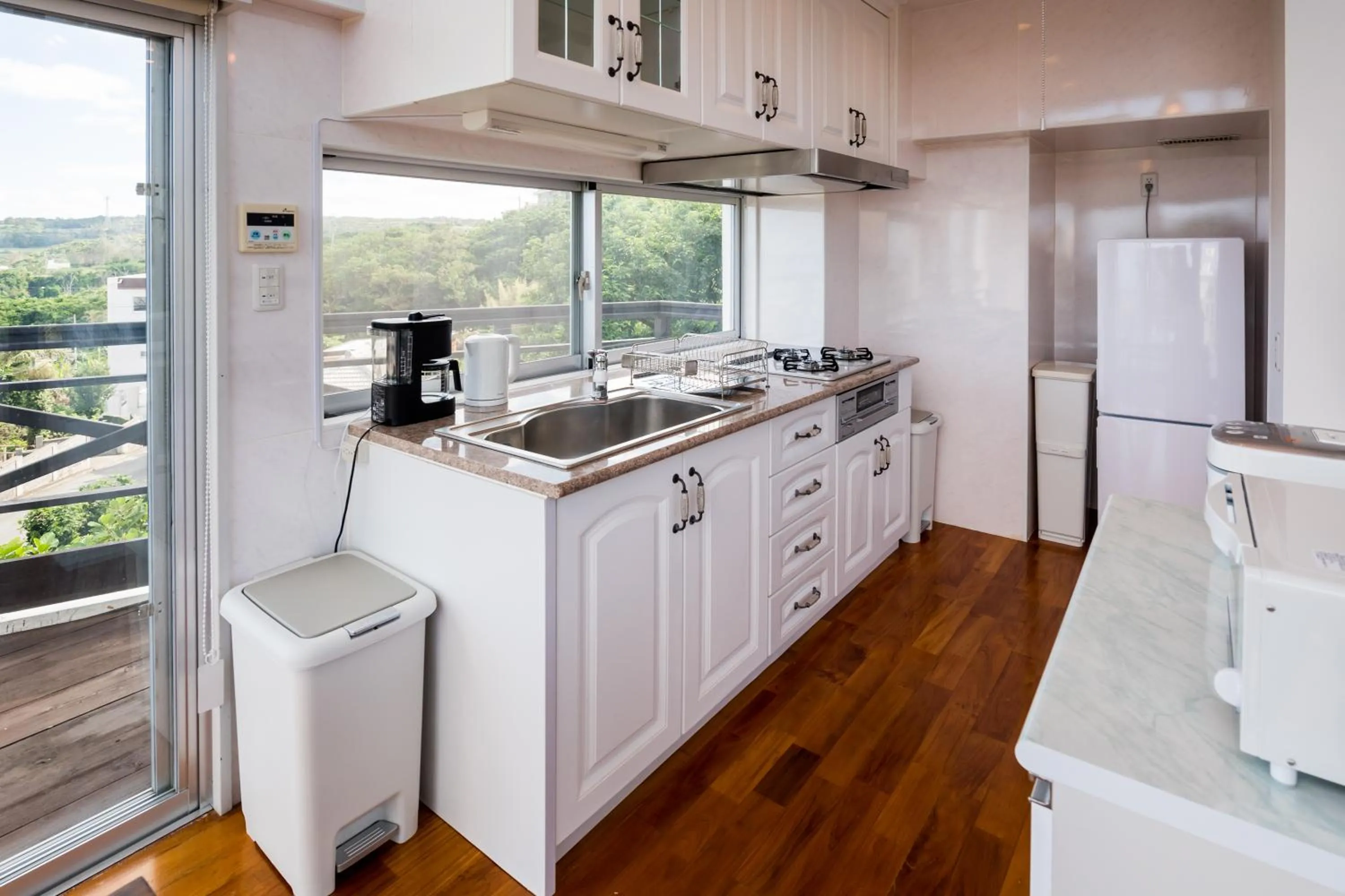 Kitchen or kitchenette in E-horizon Resort Condominium Yomitan