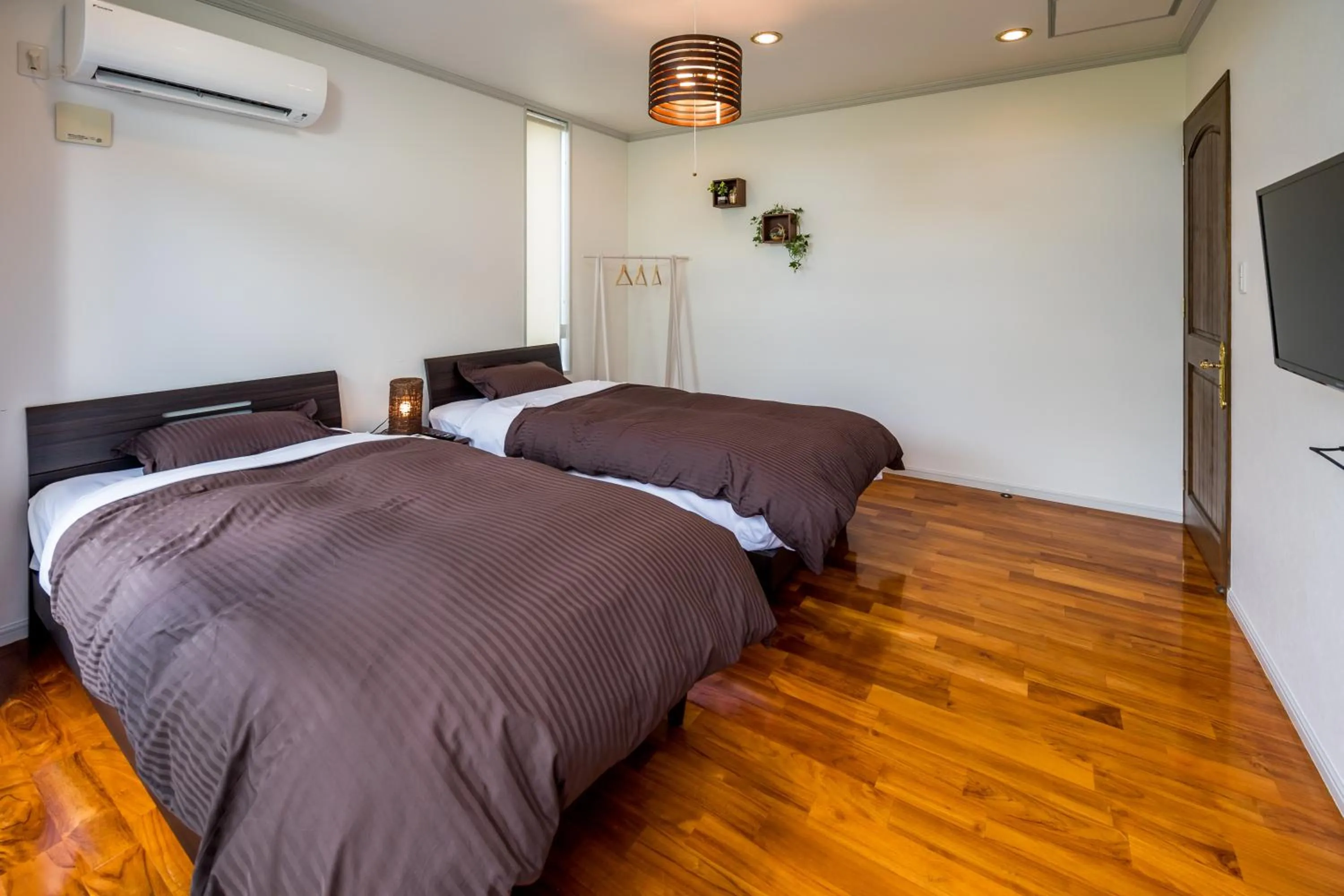 Bedroom, Bed in E-horizon Resort Condominium Yomitan