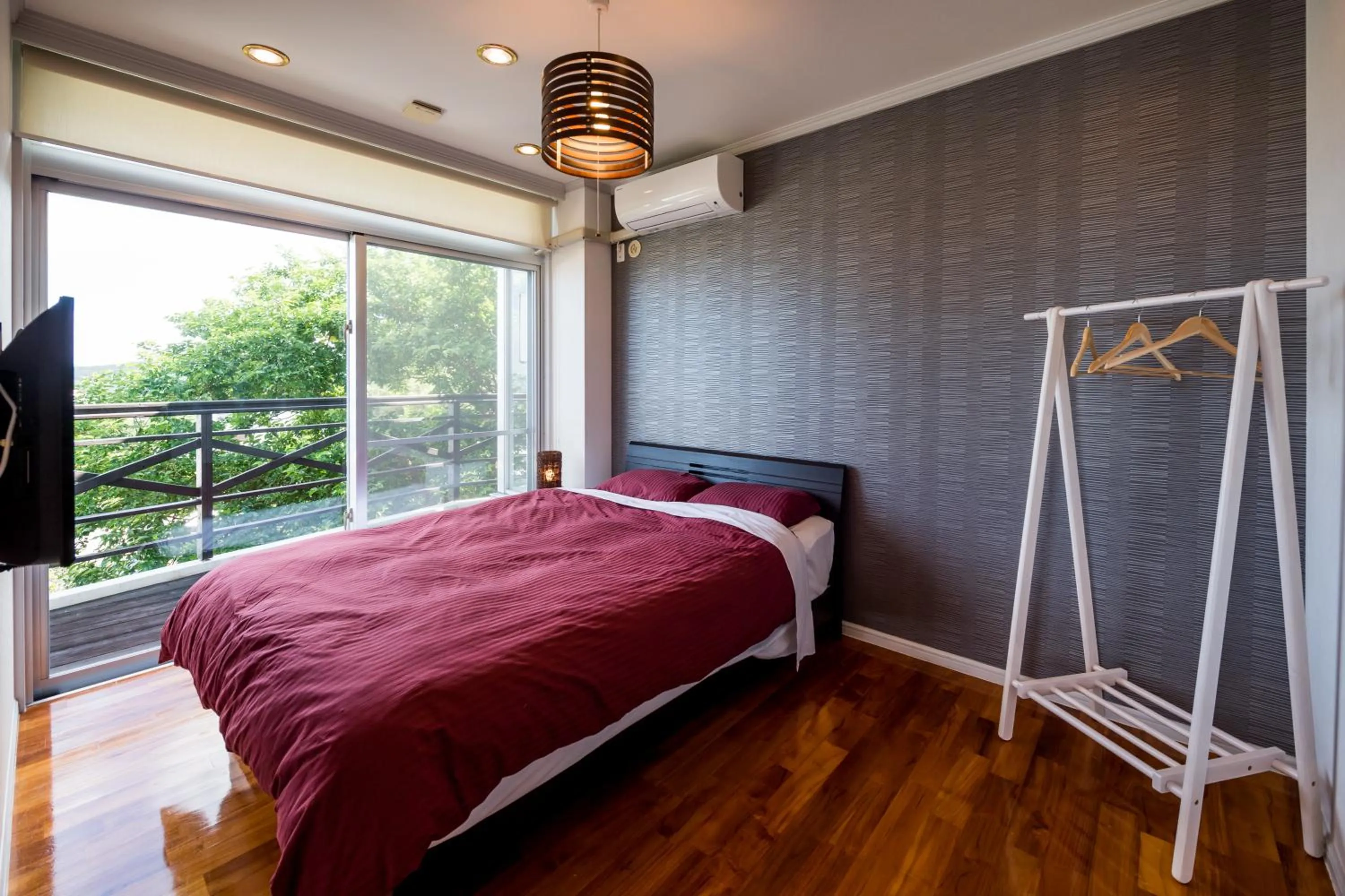 Bedroom, Bed in E-horizon Resort Condominium Yomitan