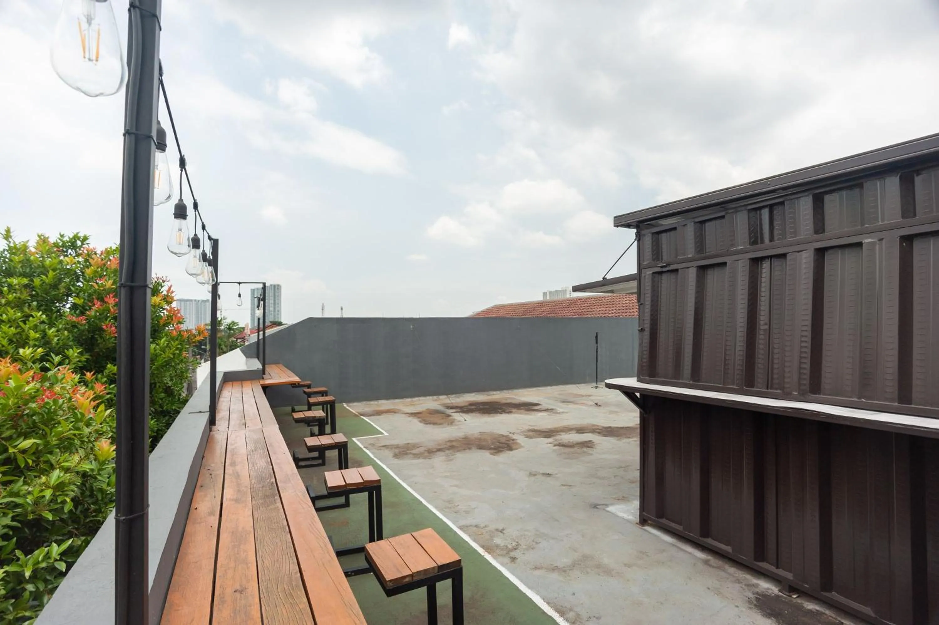 Balcony/Terrace in RedDoorz Syariah near Grand Galaxy Park