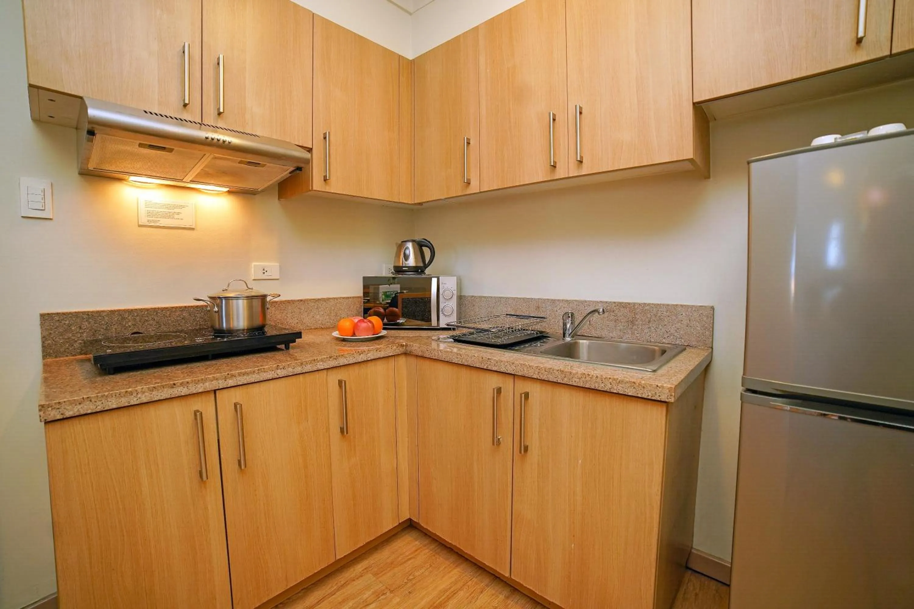 Kitchen or kitchenette in One Pacific Place Serviced Residences
