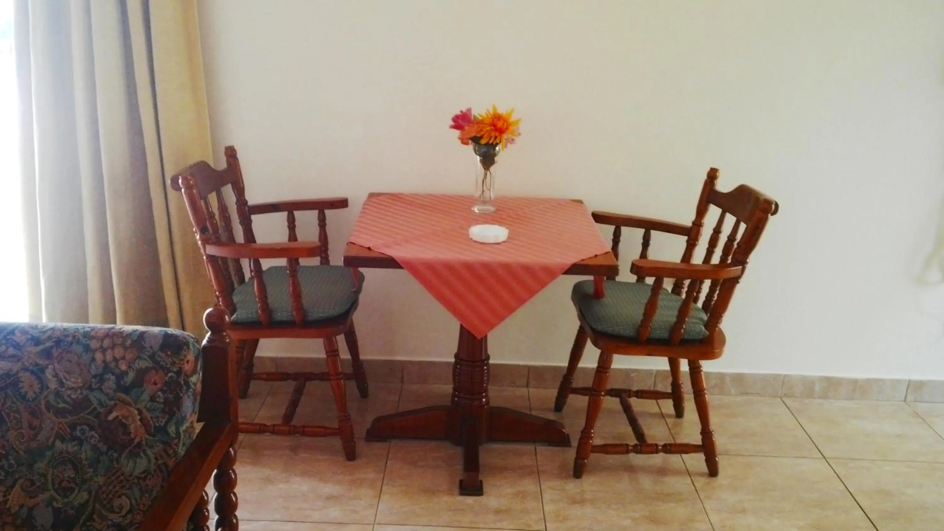 Seating area in Florence Hotel Apartments