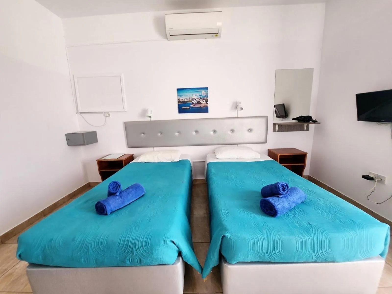 Bed in Florence Hotel Apartments