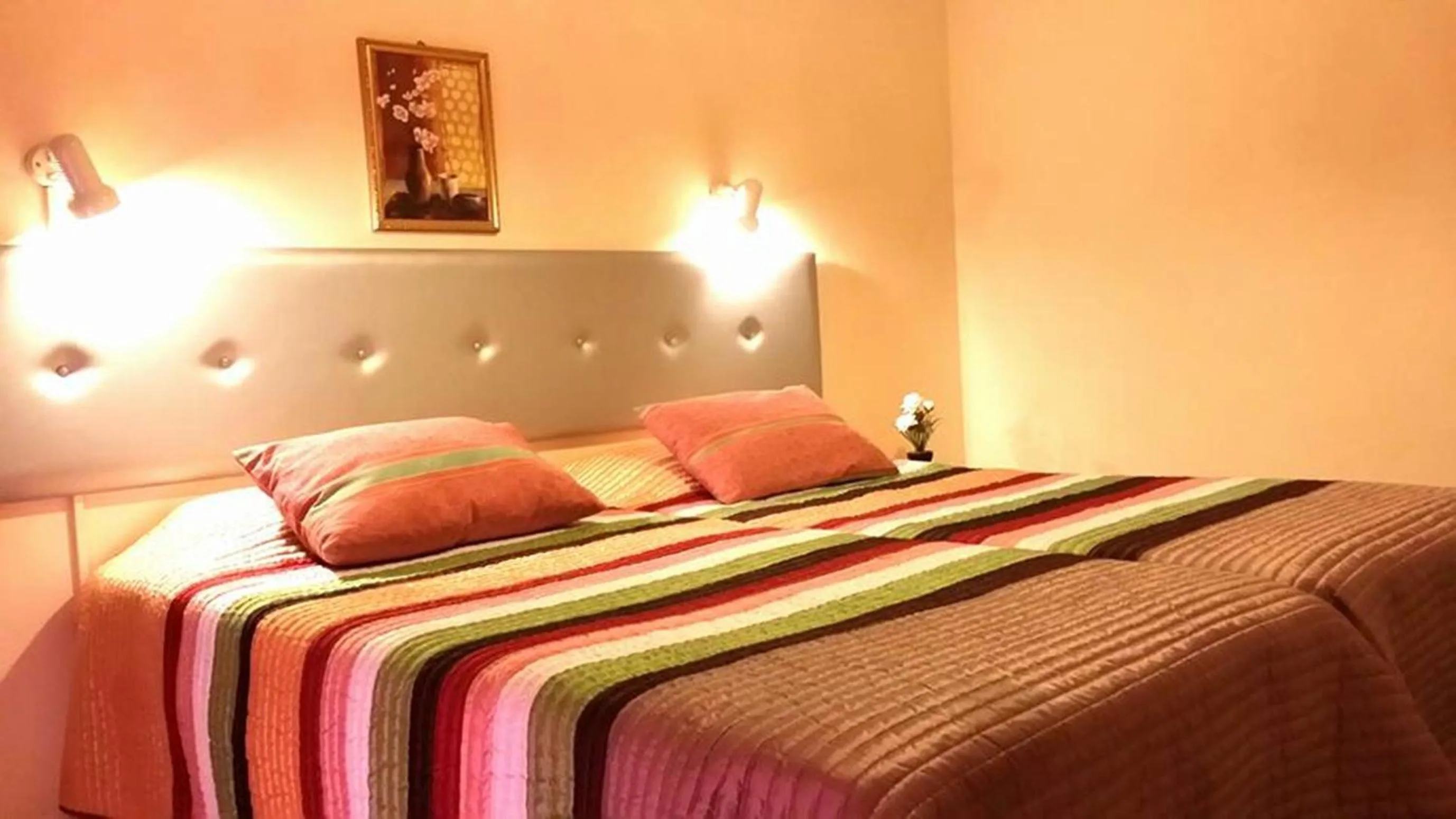 Bed in Florence Hotel Apartments