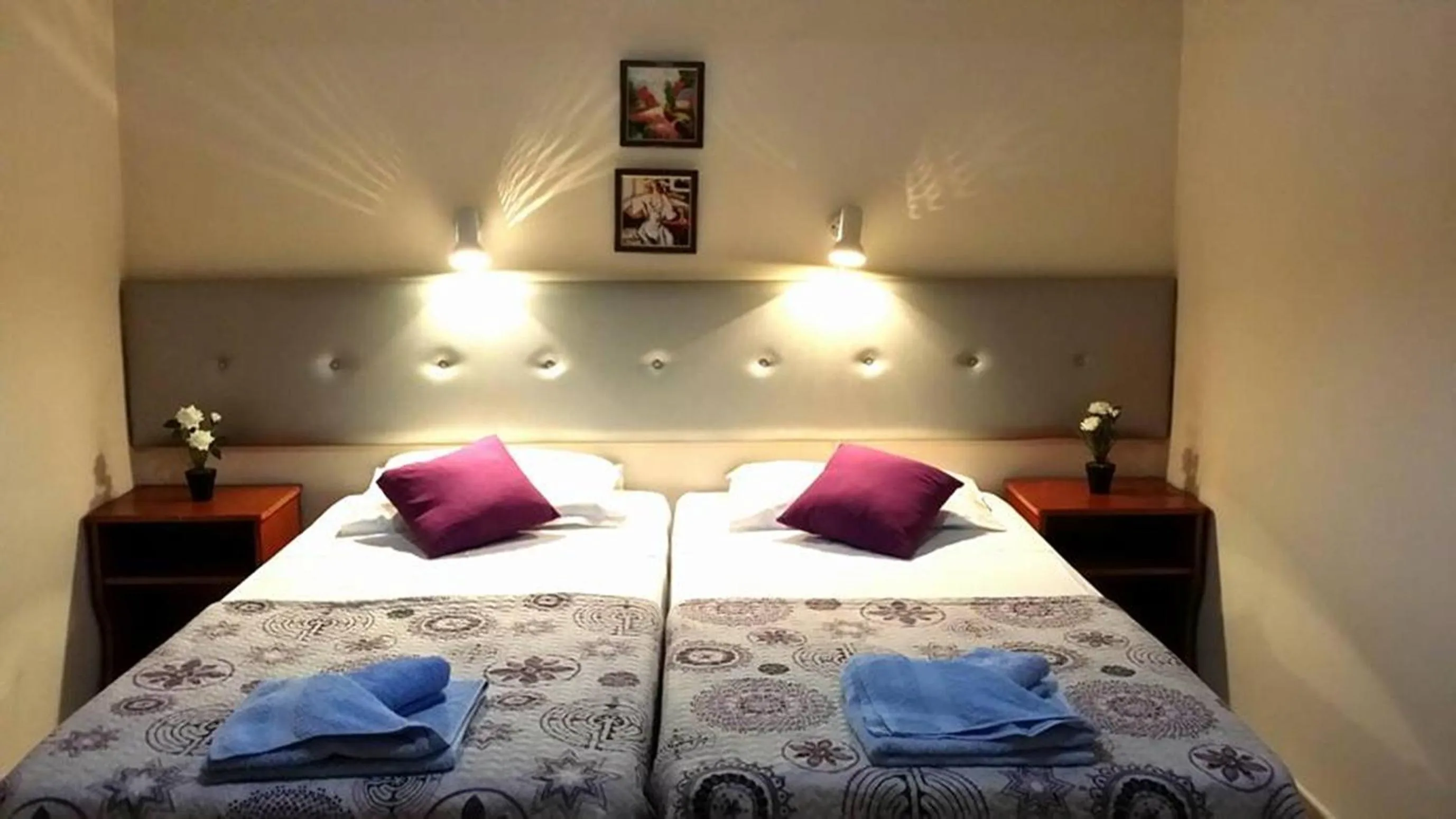 Bed in Florence Hotel Apartments