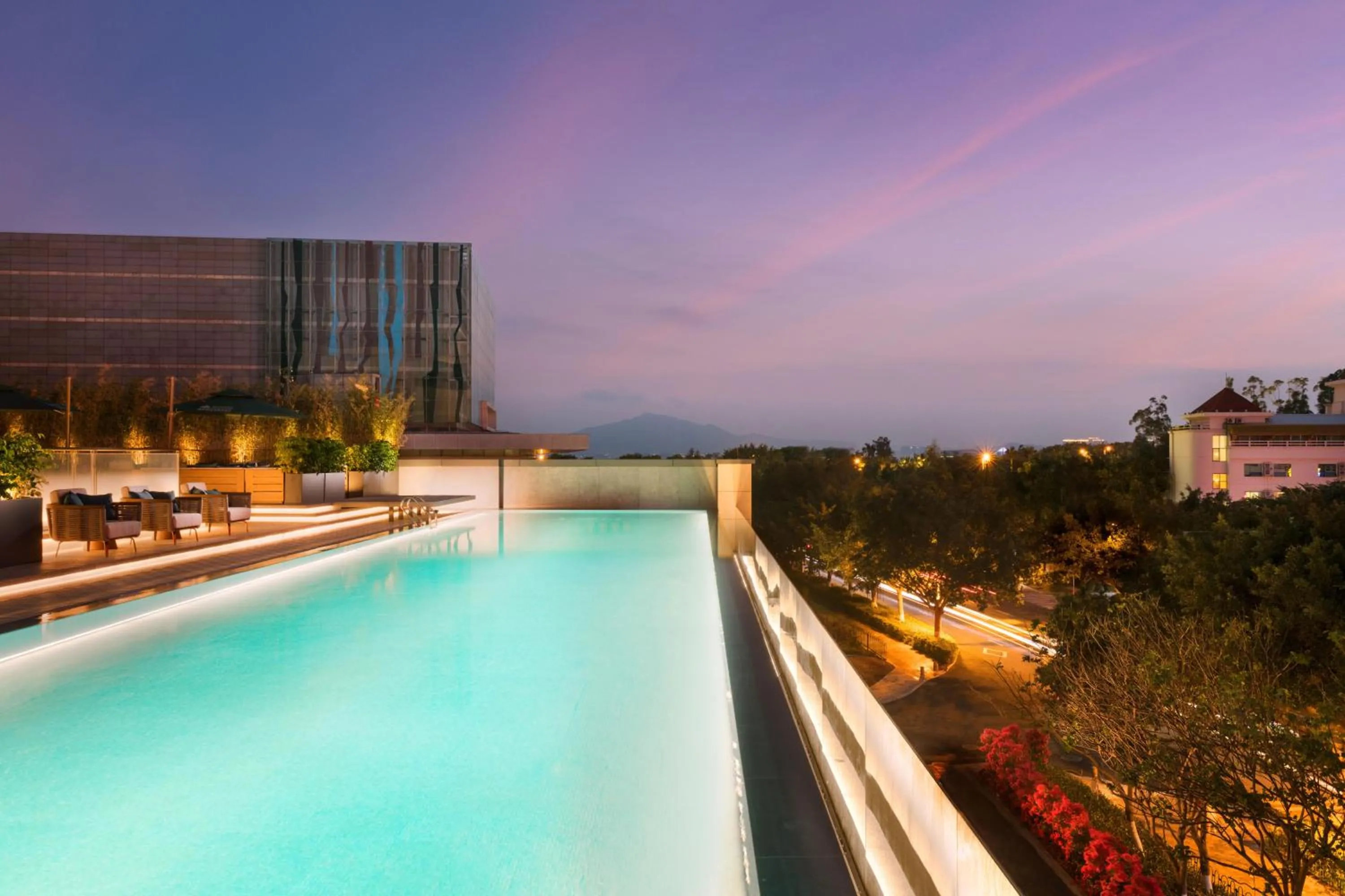 Swimming pool in Joyze Hotel Xiamen, Curio Collection By Hilton