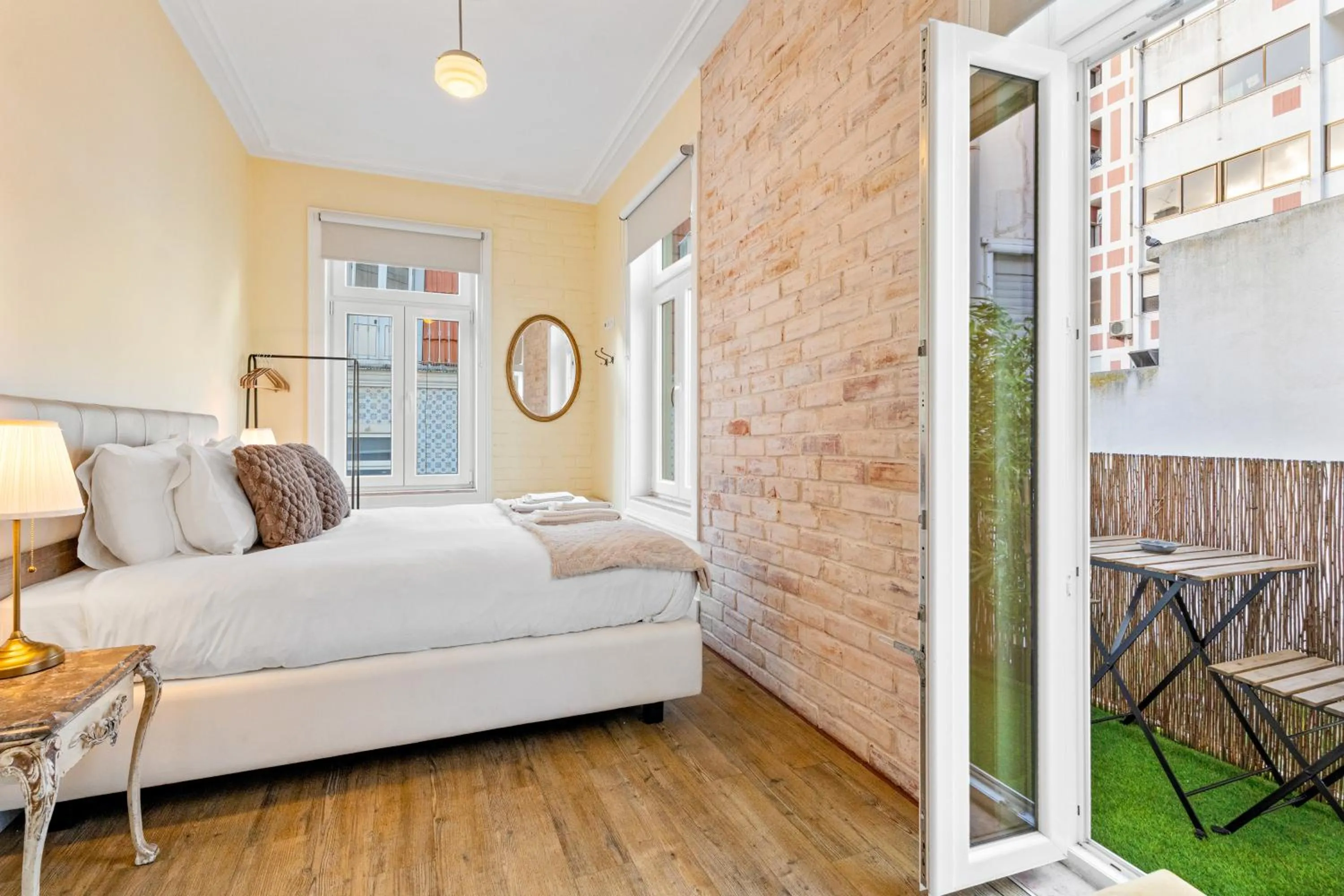 Bed in 1898 Home & Suites