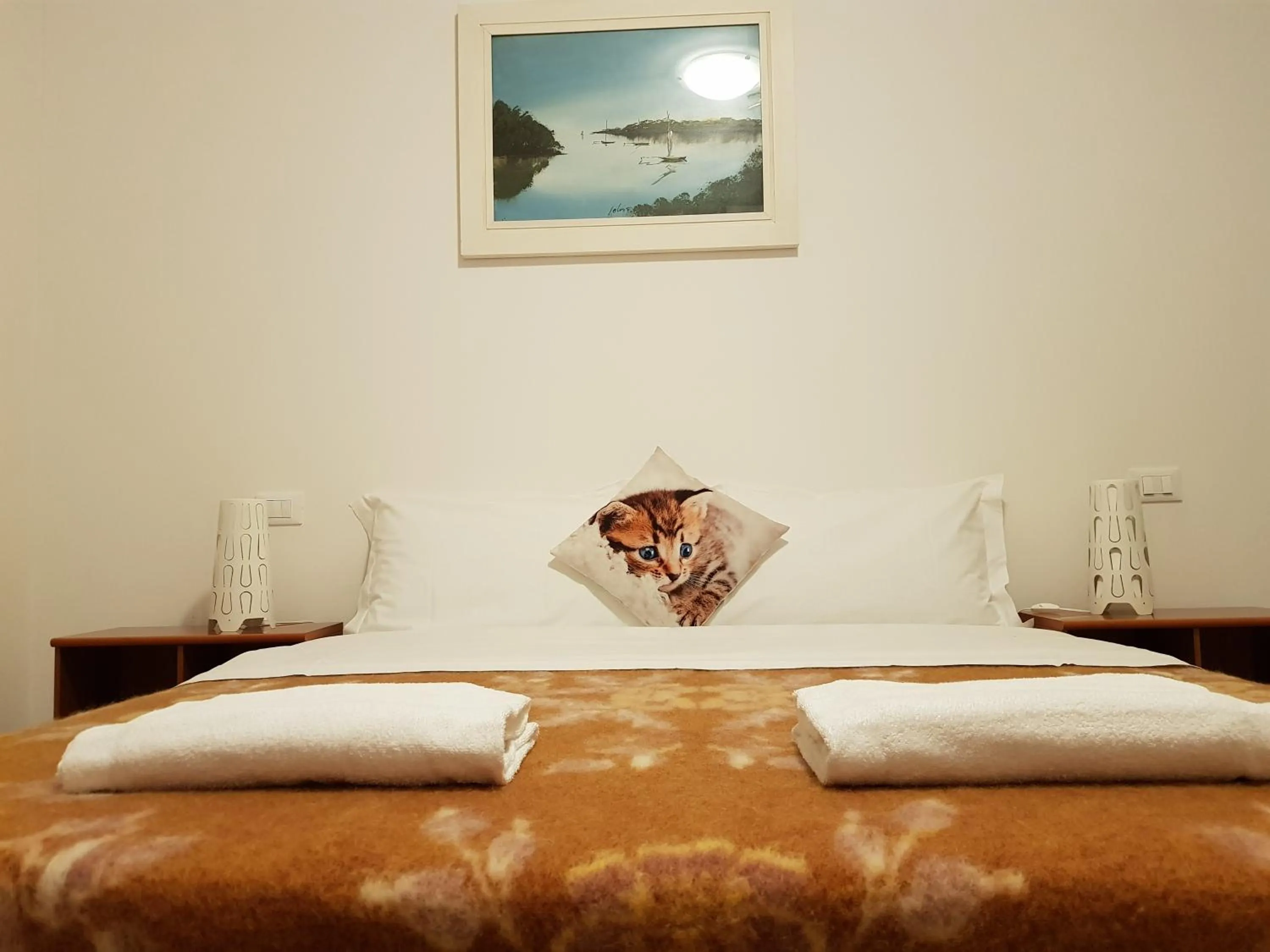 Bed in Rosa Garden B&B