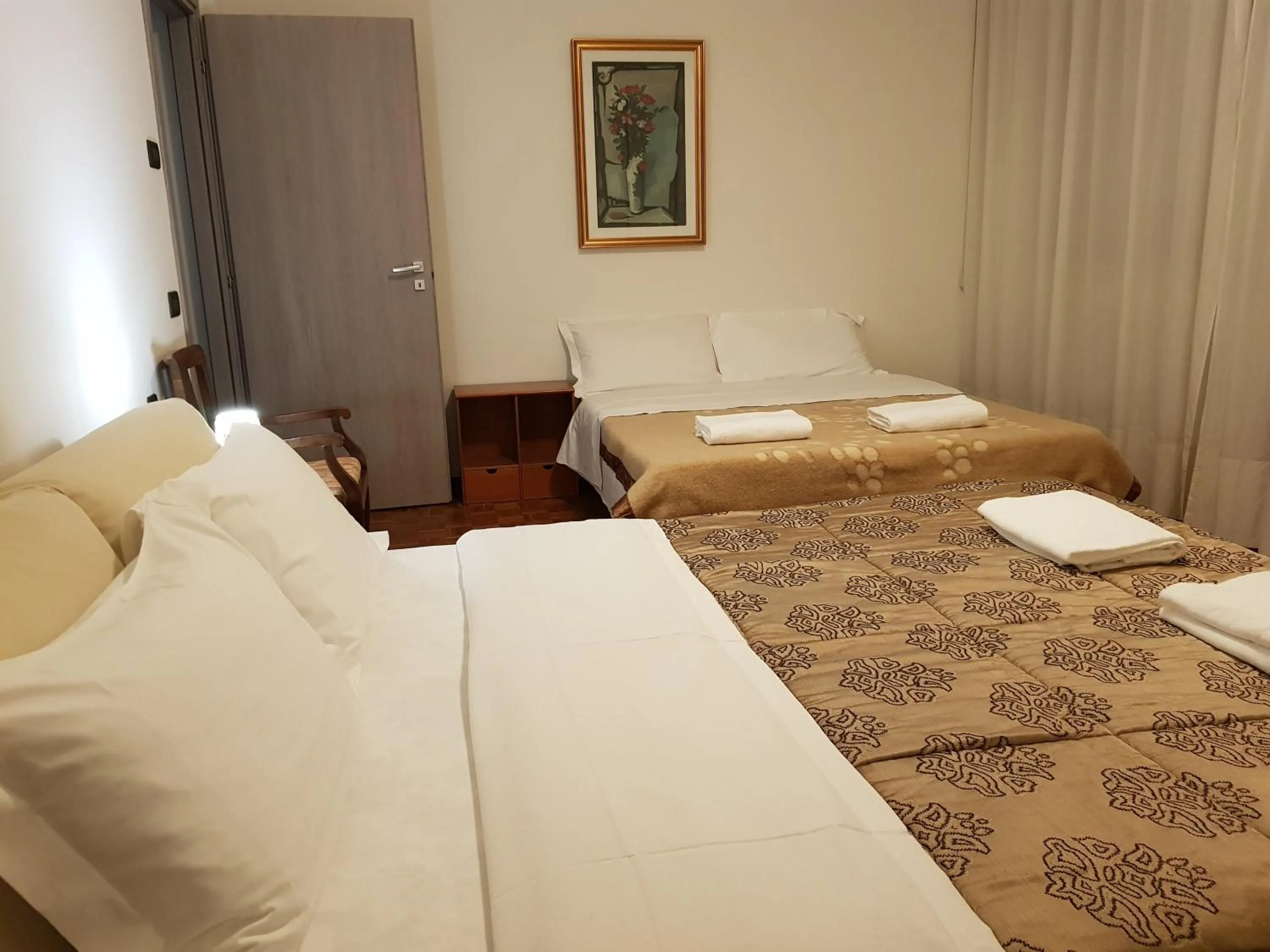 Bed in Rosa Garden B&B