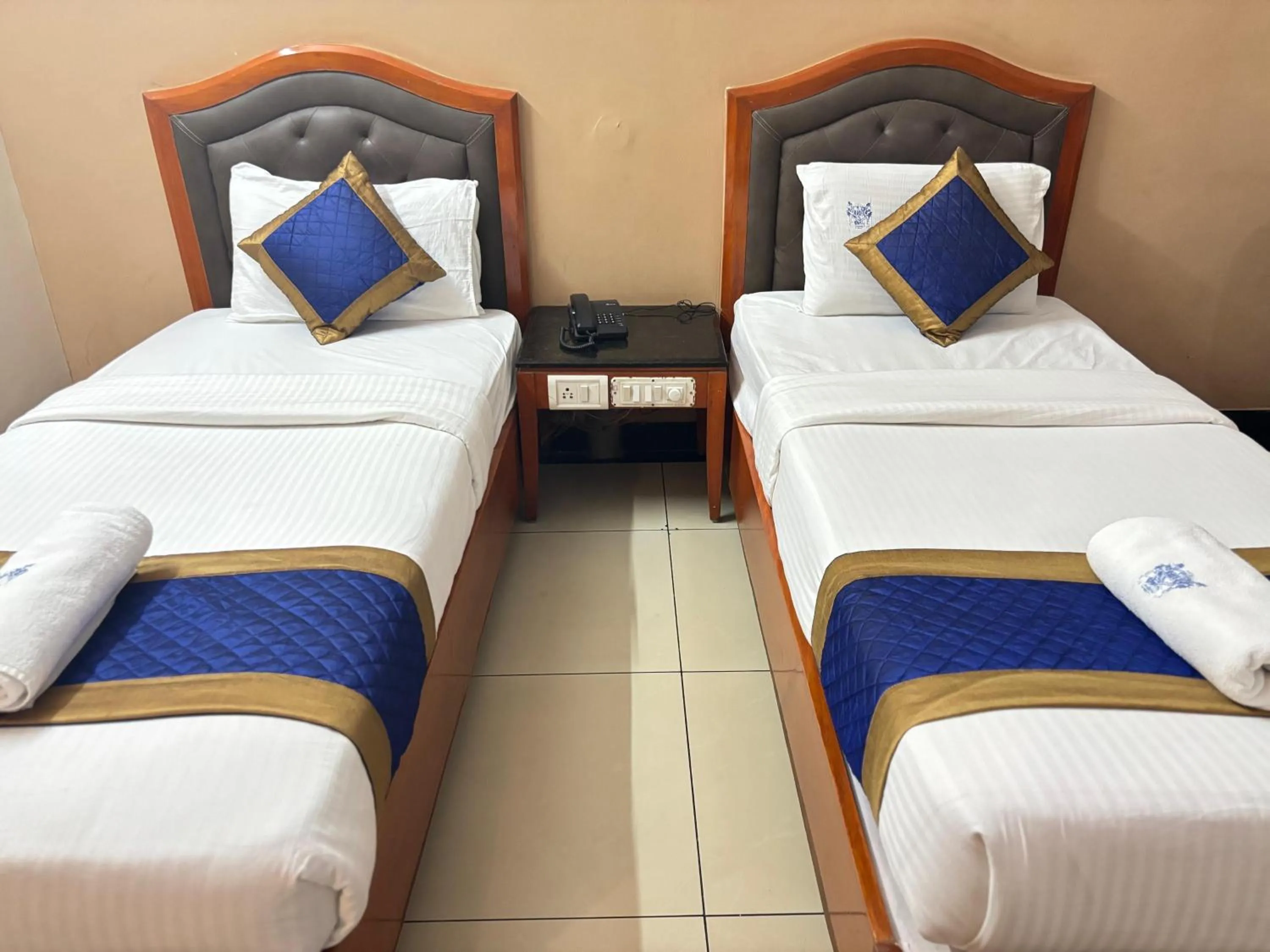 Bed in Hotel Chetan International