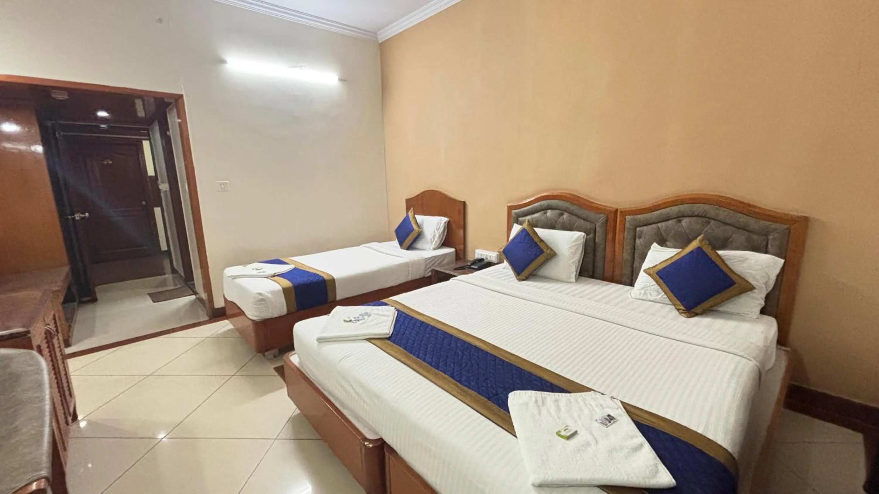 Bed in Hotel Chetan International