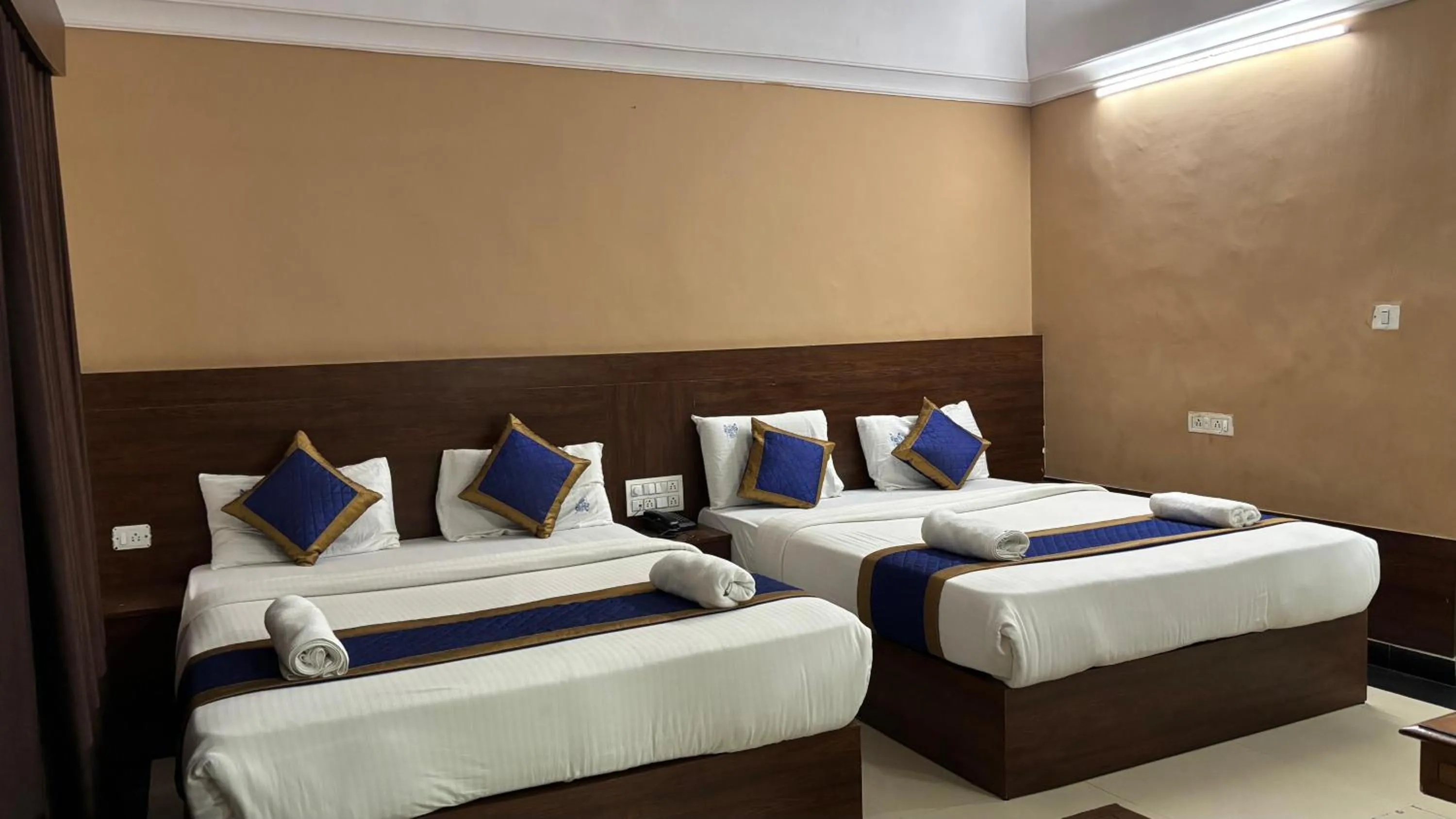 Bed in Hotel Chetan International