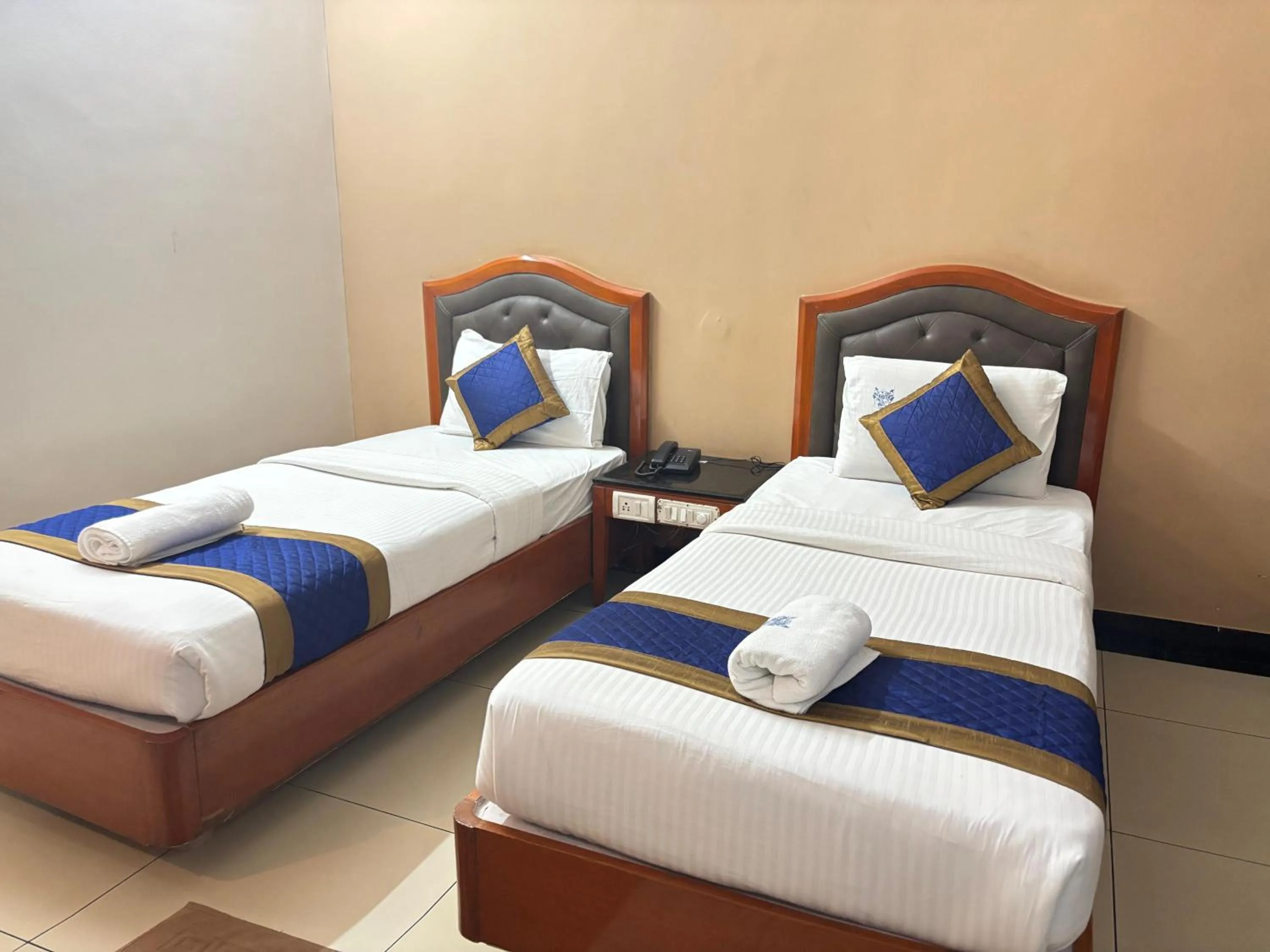 Bed in Hotel Chetan International