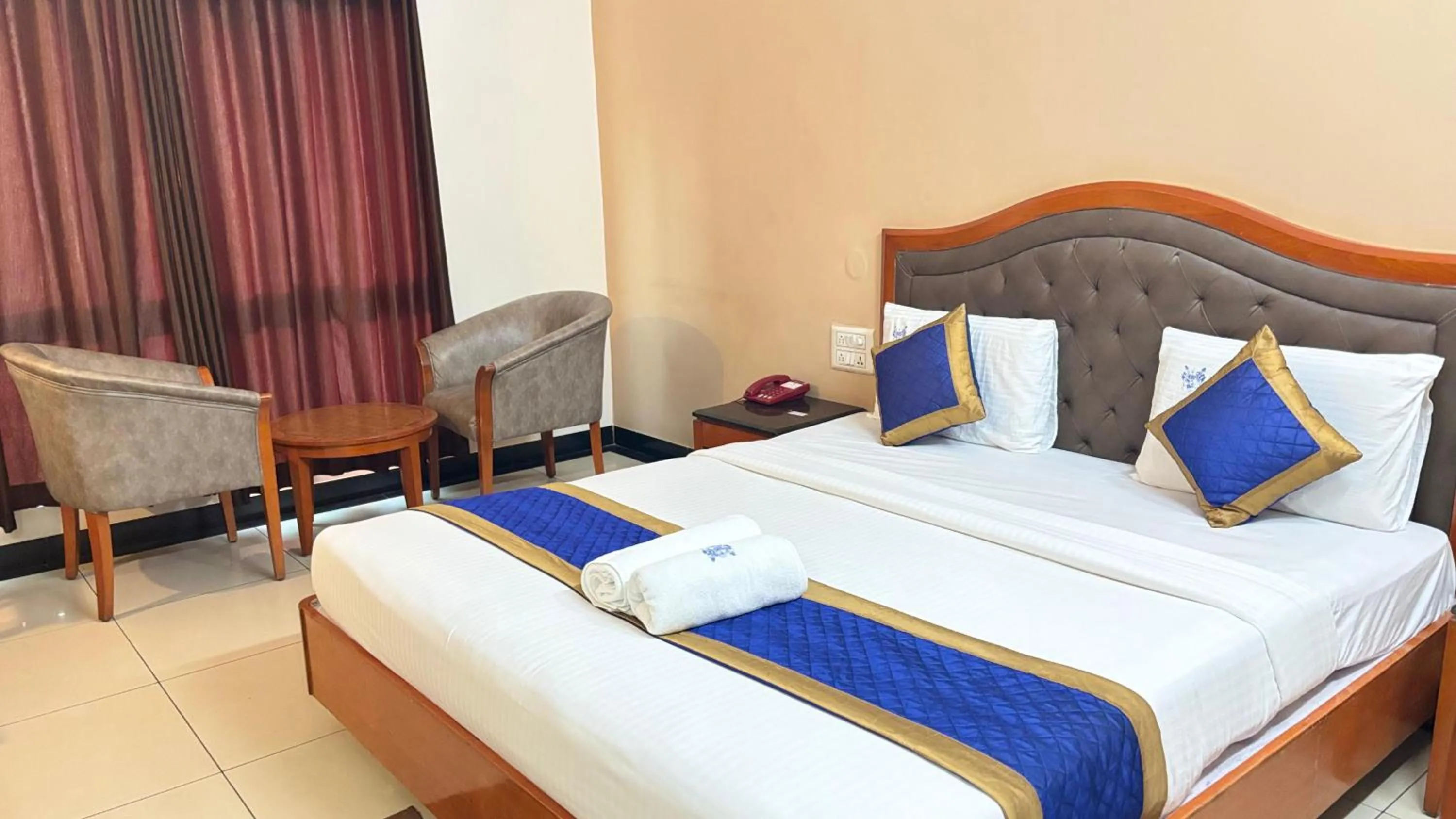 Bed in Hotel Chetan International