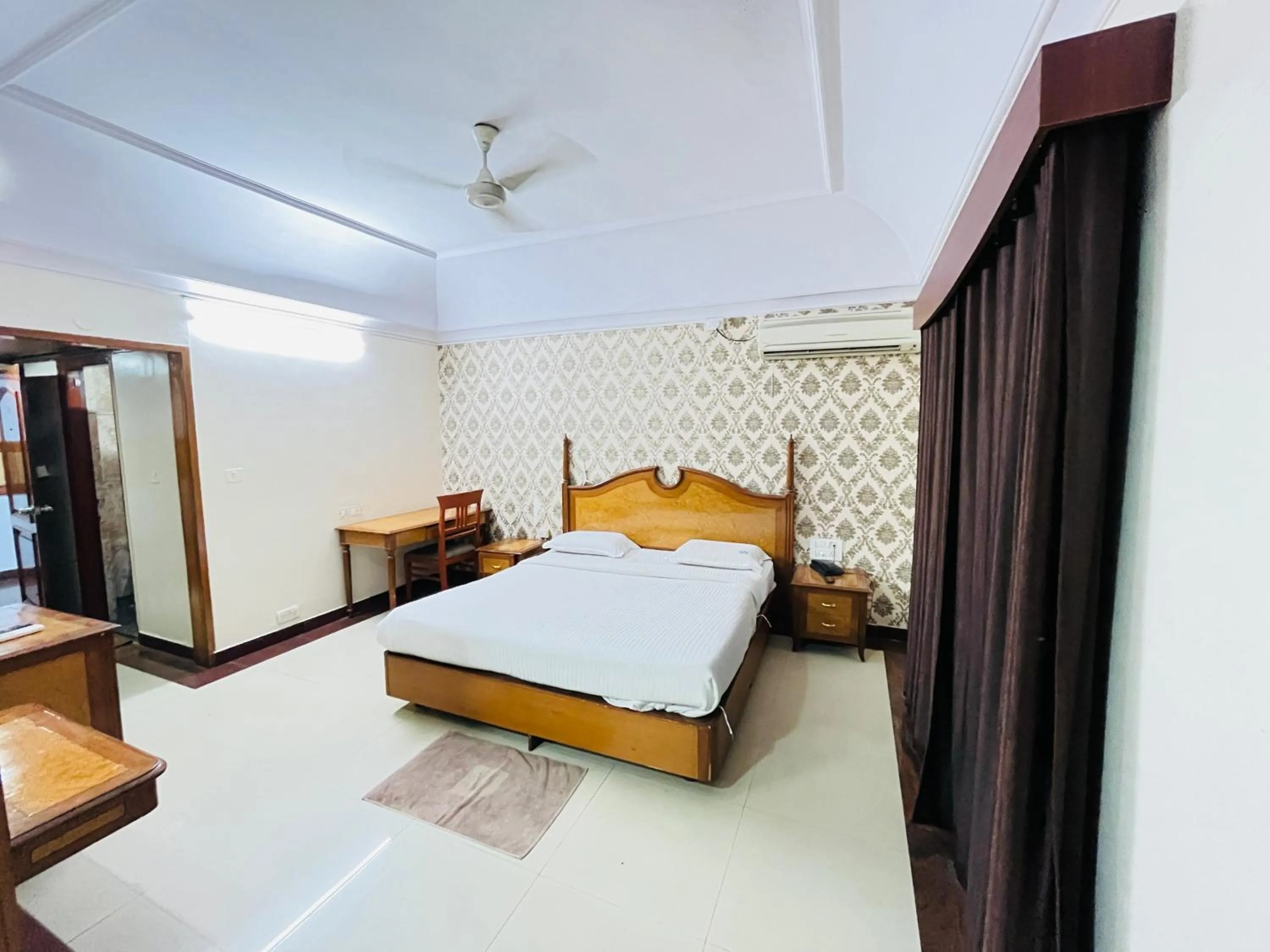 Bed in Hotel Chetan International