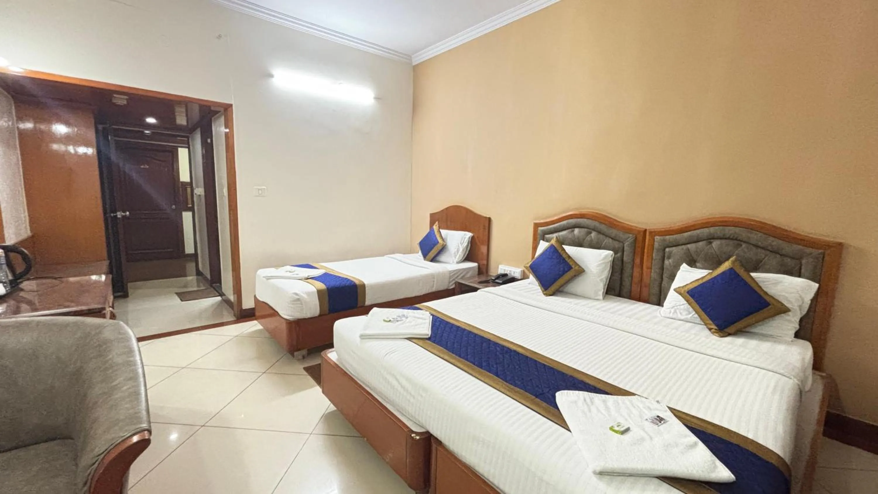 Bed in Hotel Chetan International