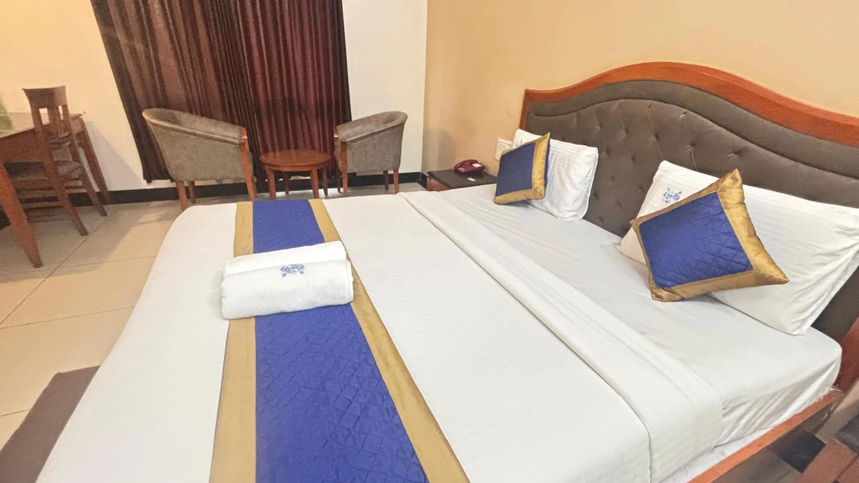 Bed in Hotel Chetan International