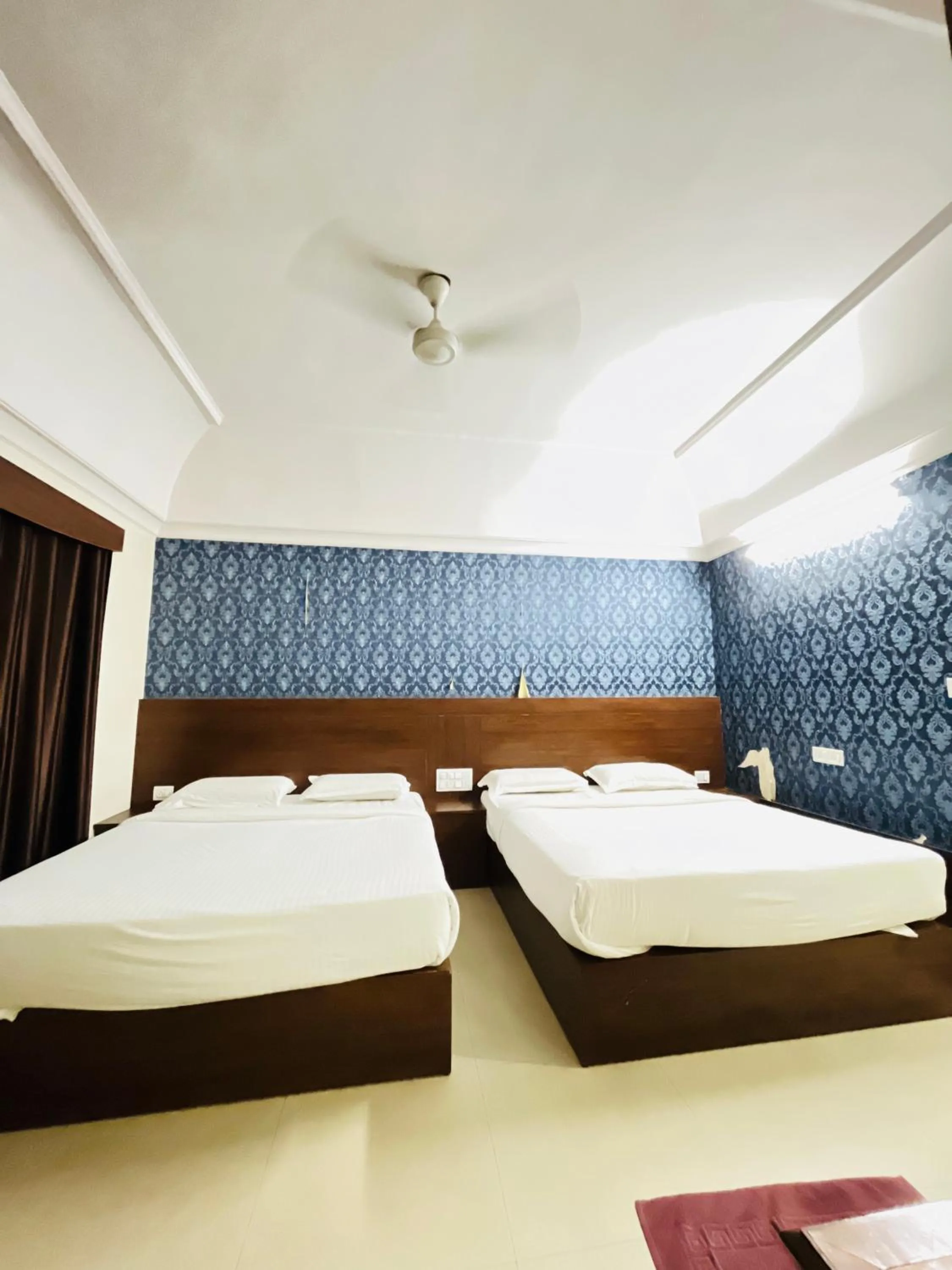 Bed in Hotel Chetan International