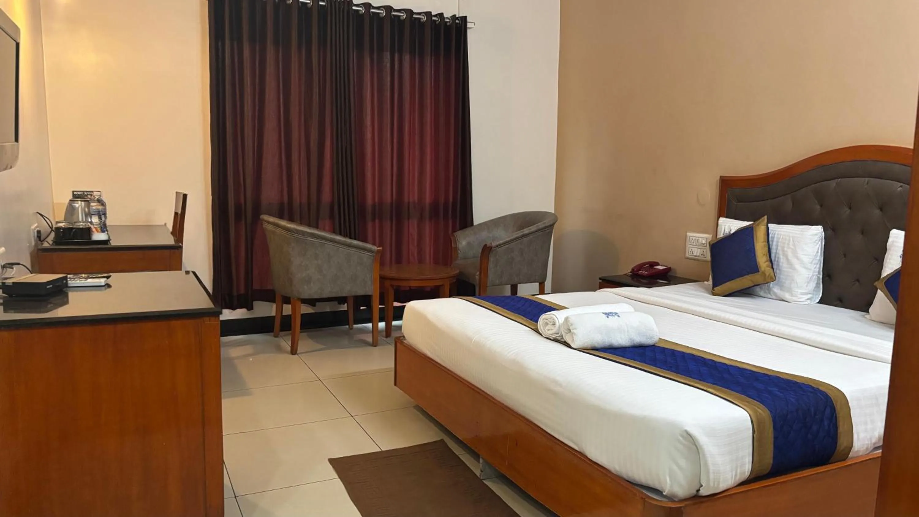 Bed in Hotel Chetan International