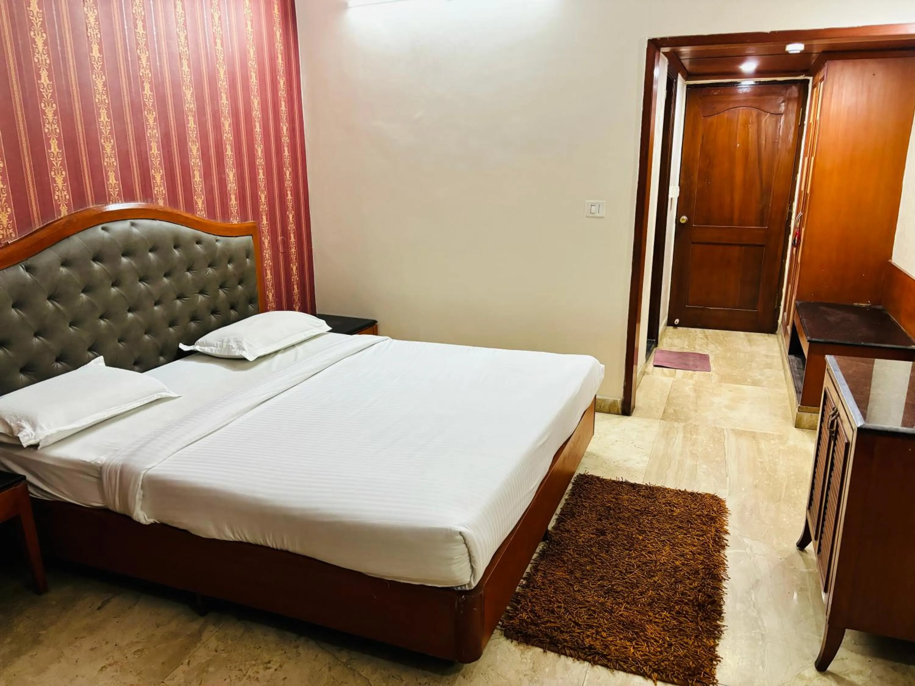 Bed in Hotel Chetan International
